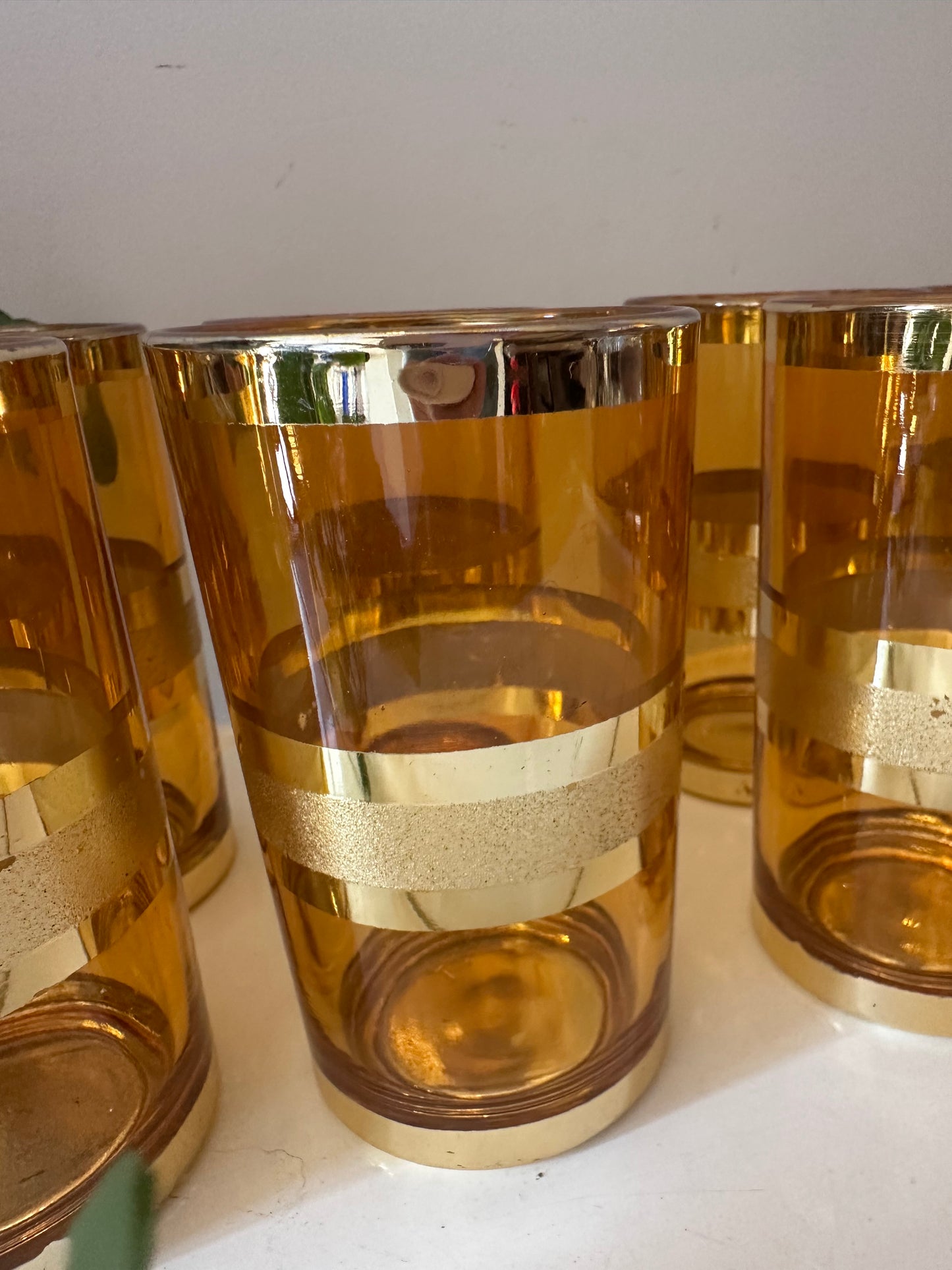 Set van 8 goud/amberkleurige glazen