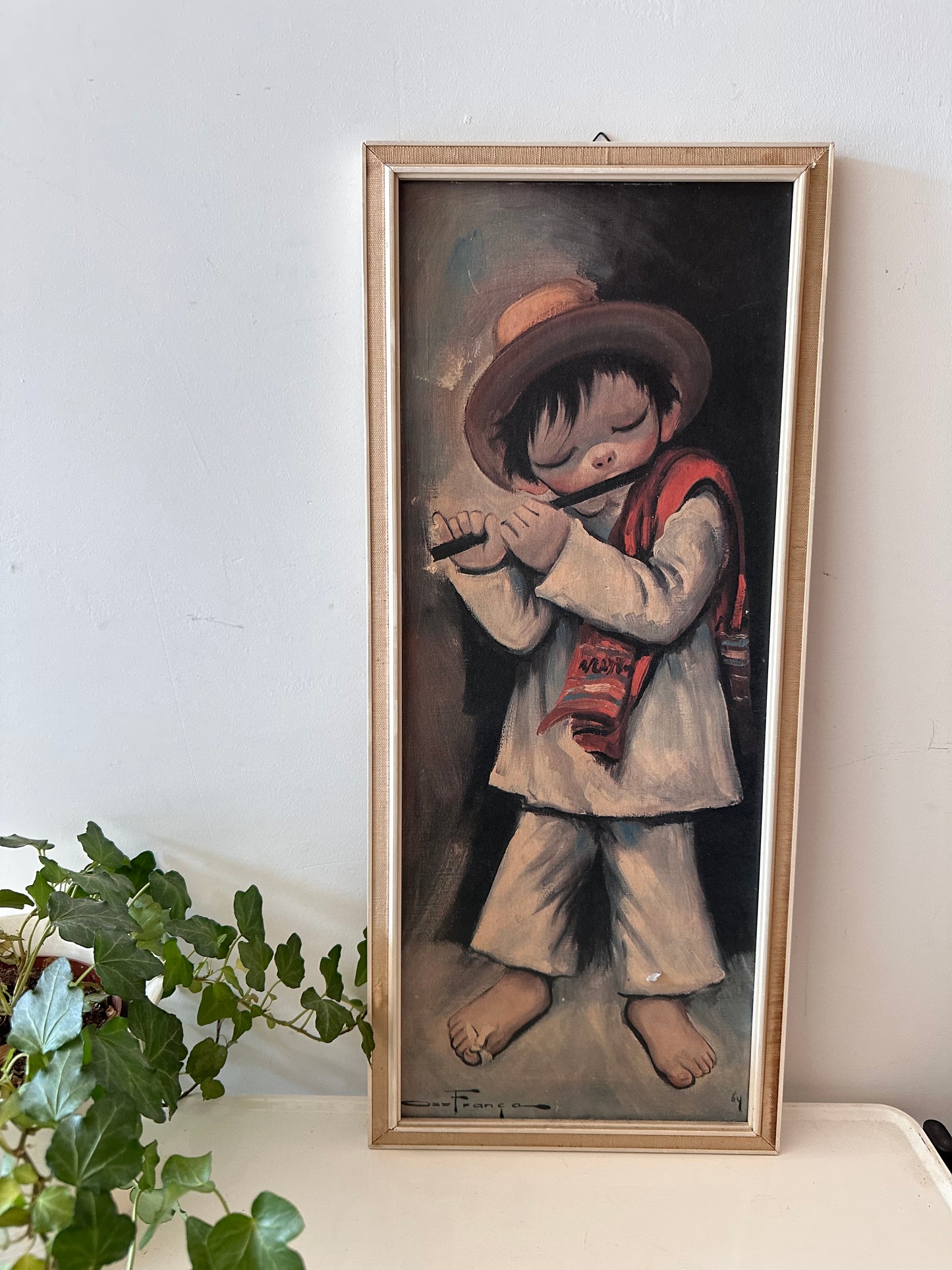 Schilderij met fluitend jongetje