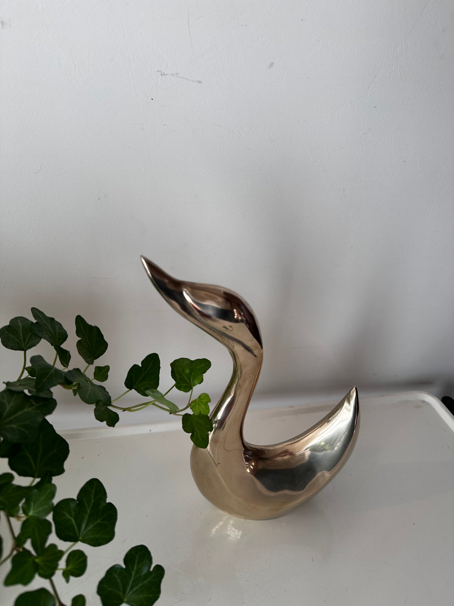 Vintage messing zwaan