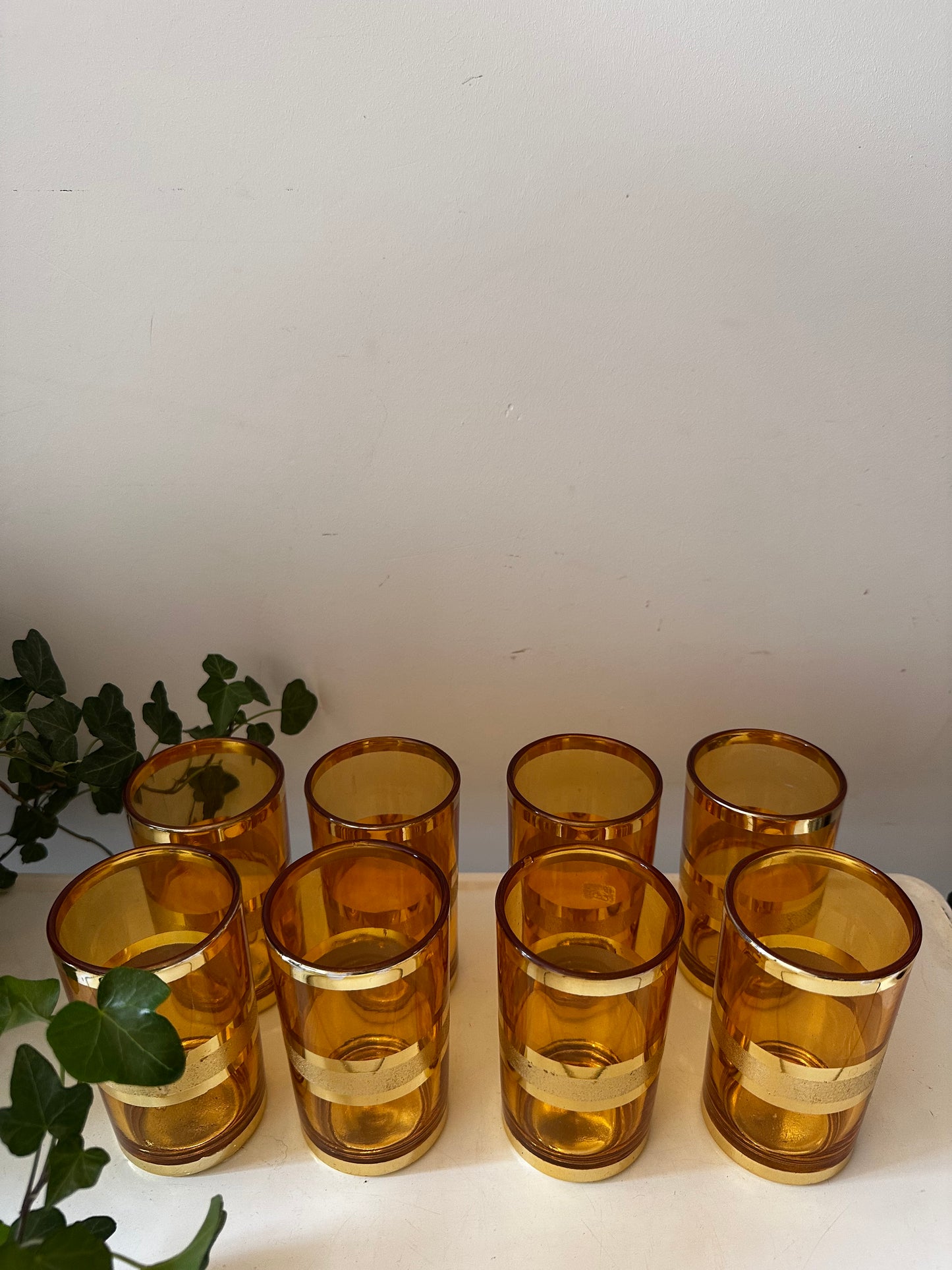 Set van 8 goud/amberkleurige glazen