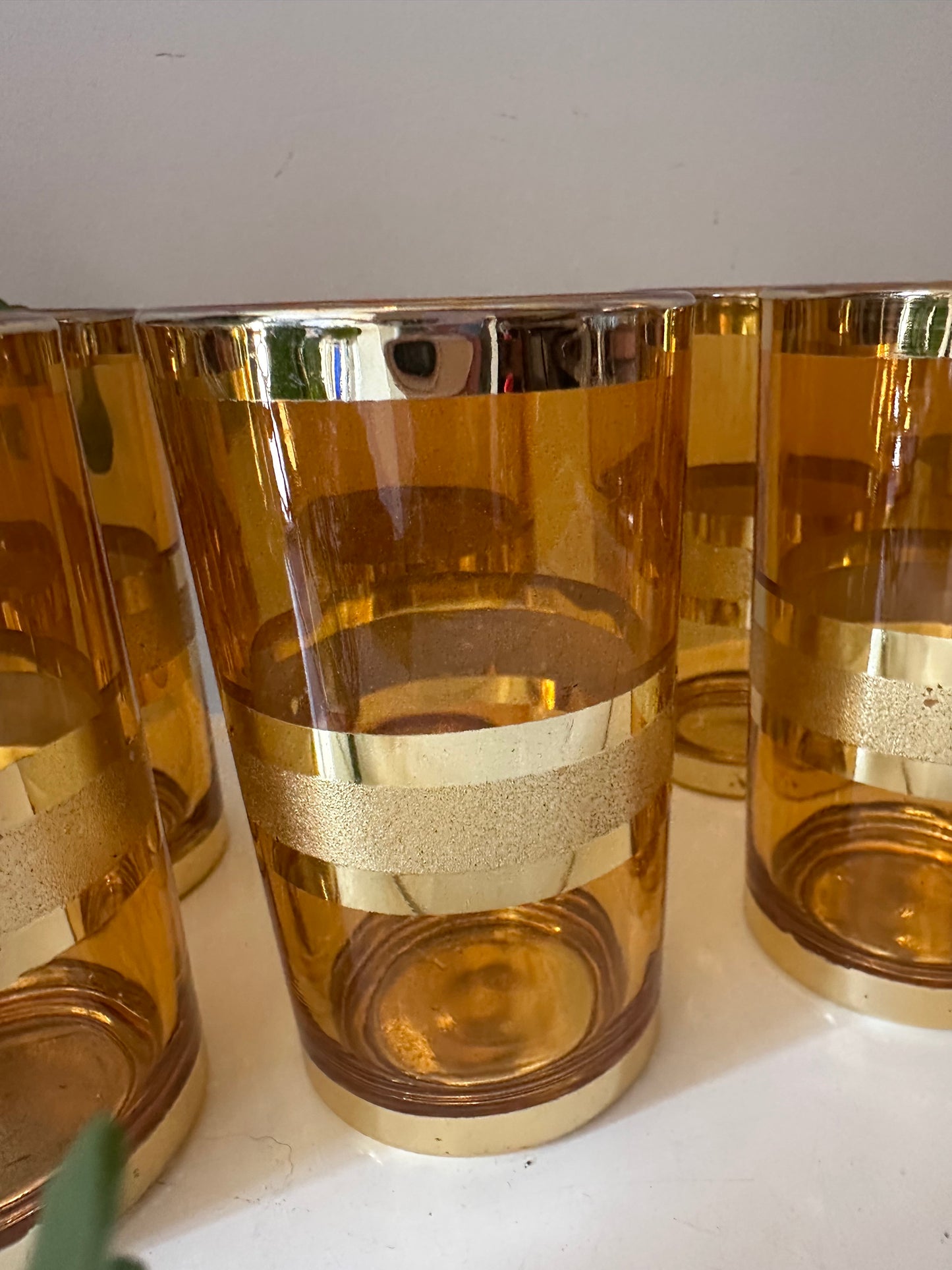 Set van 8 goud/amberkleurige glazen