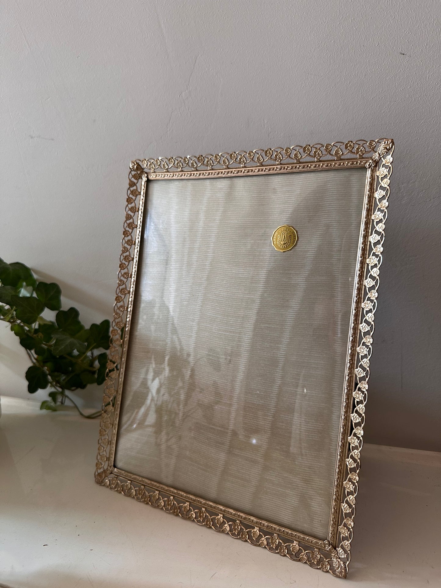 Jaren 60 fotolijstje met bol glas