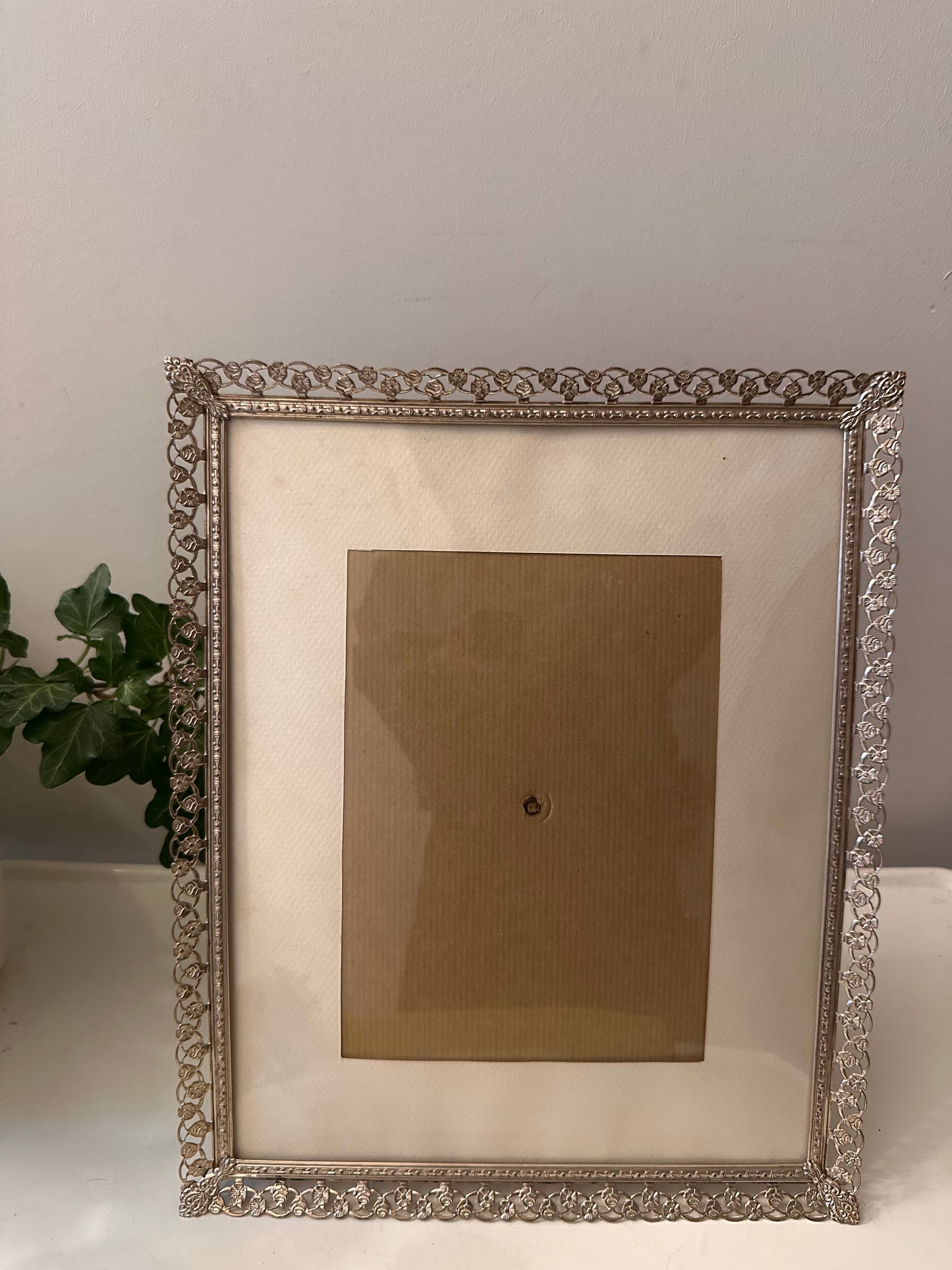 Jaren 60 fotolijstje met opengewerkte rand