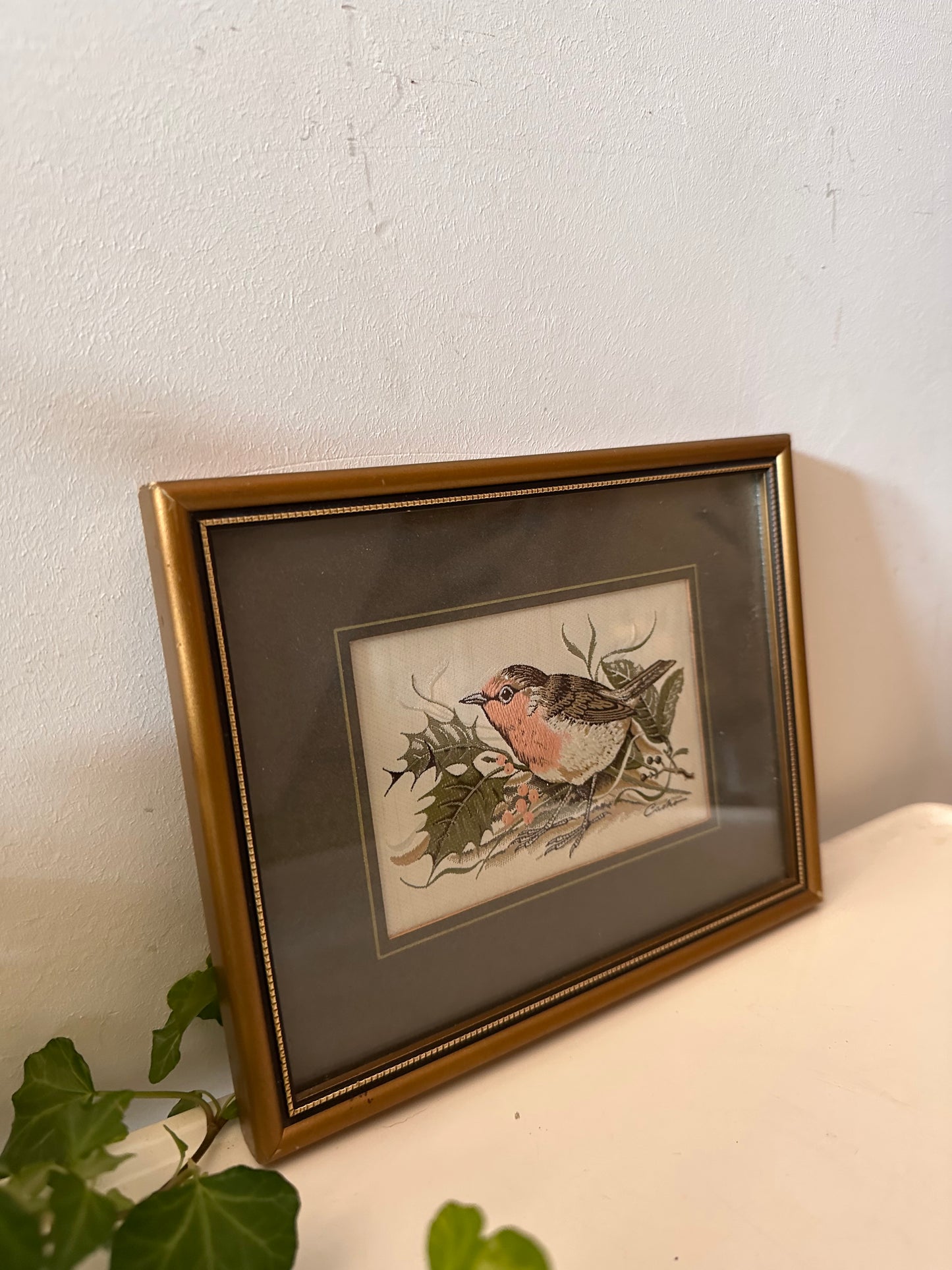 Geweven vogeltje in lijst