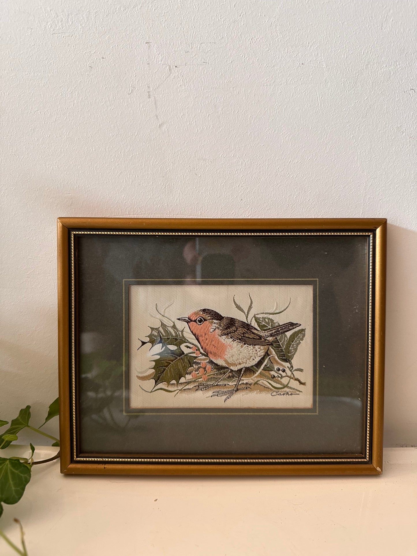 Geweven vogeltje in lijst