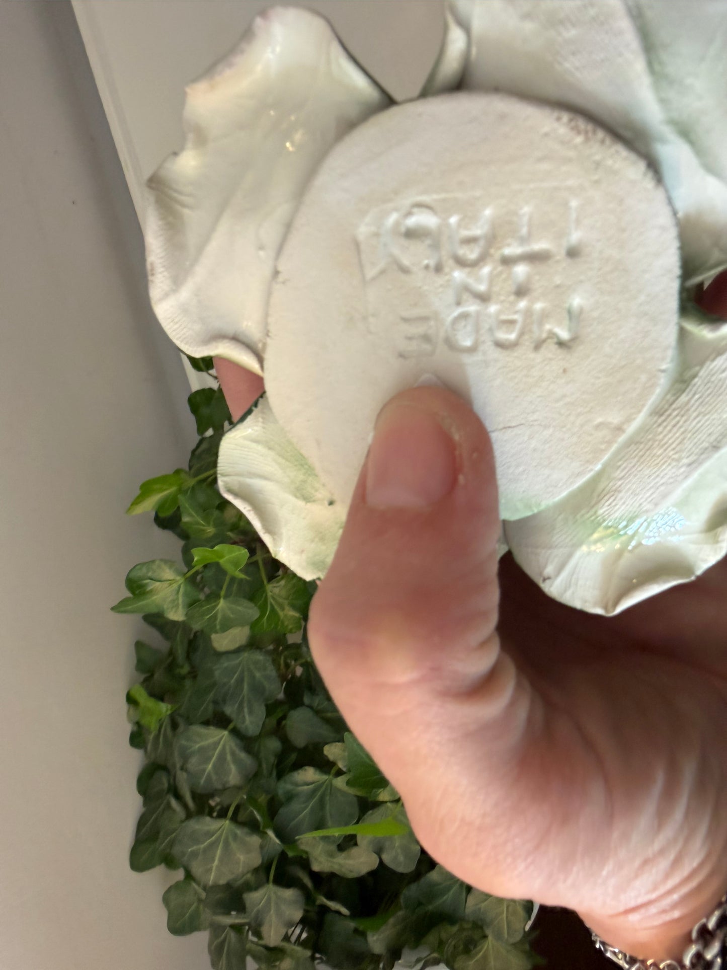 Kandelaar in de vorm van een roze roos