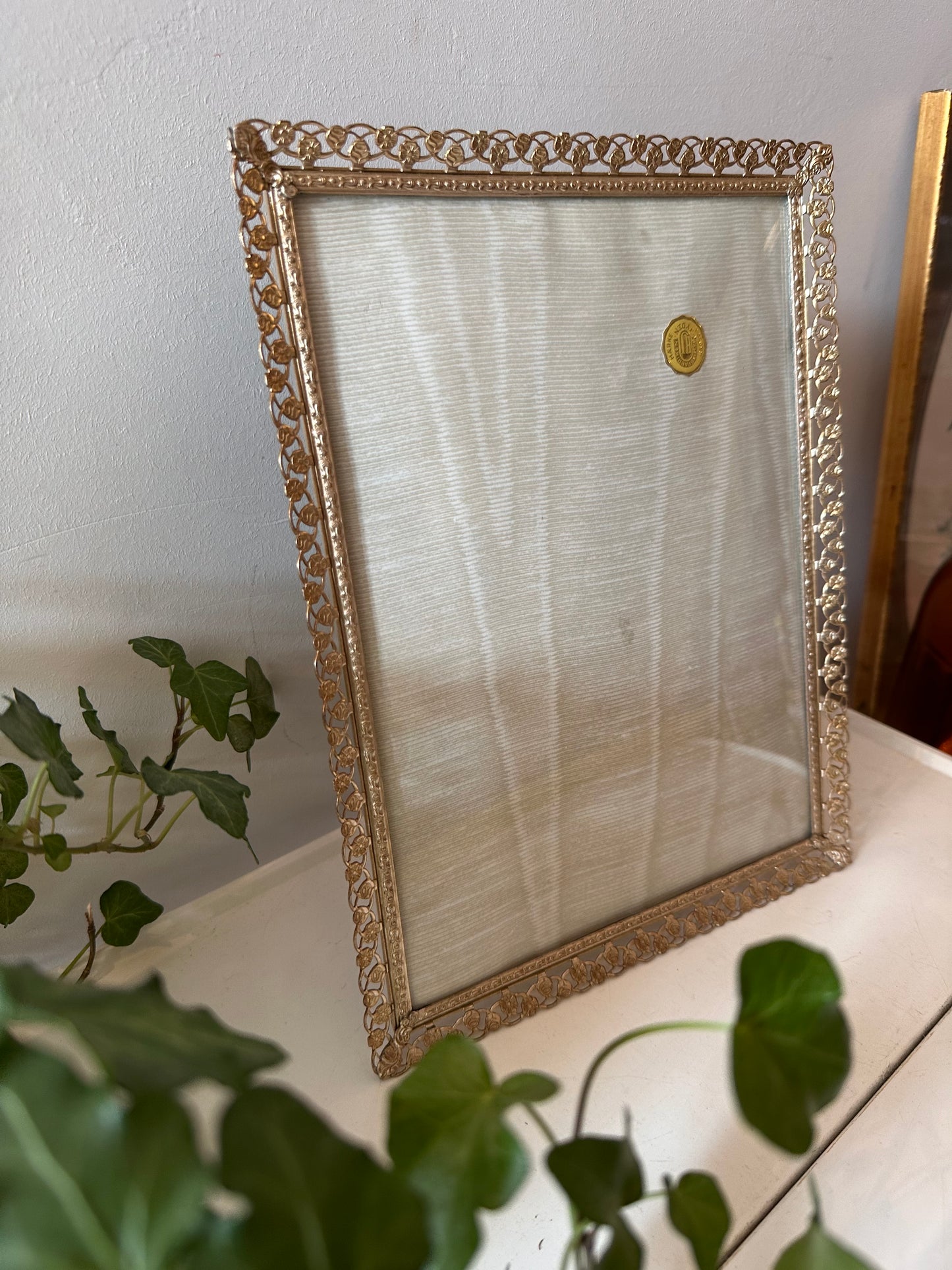 Jaren 60 fotolijstje met bol glas