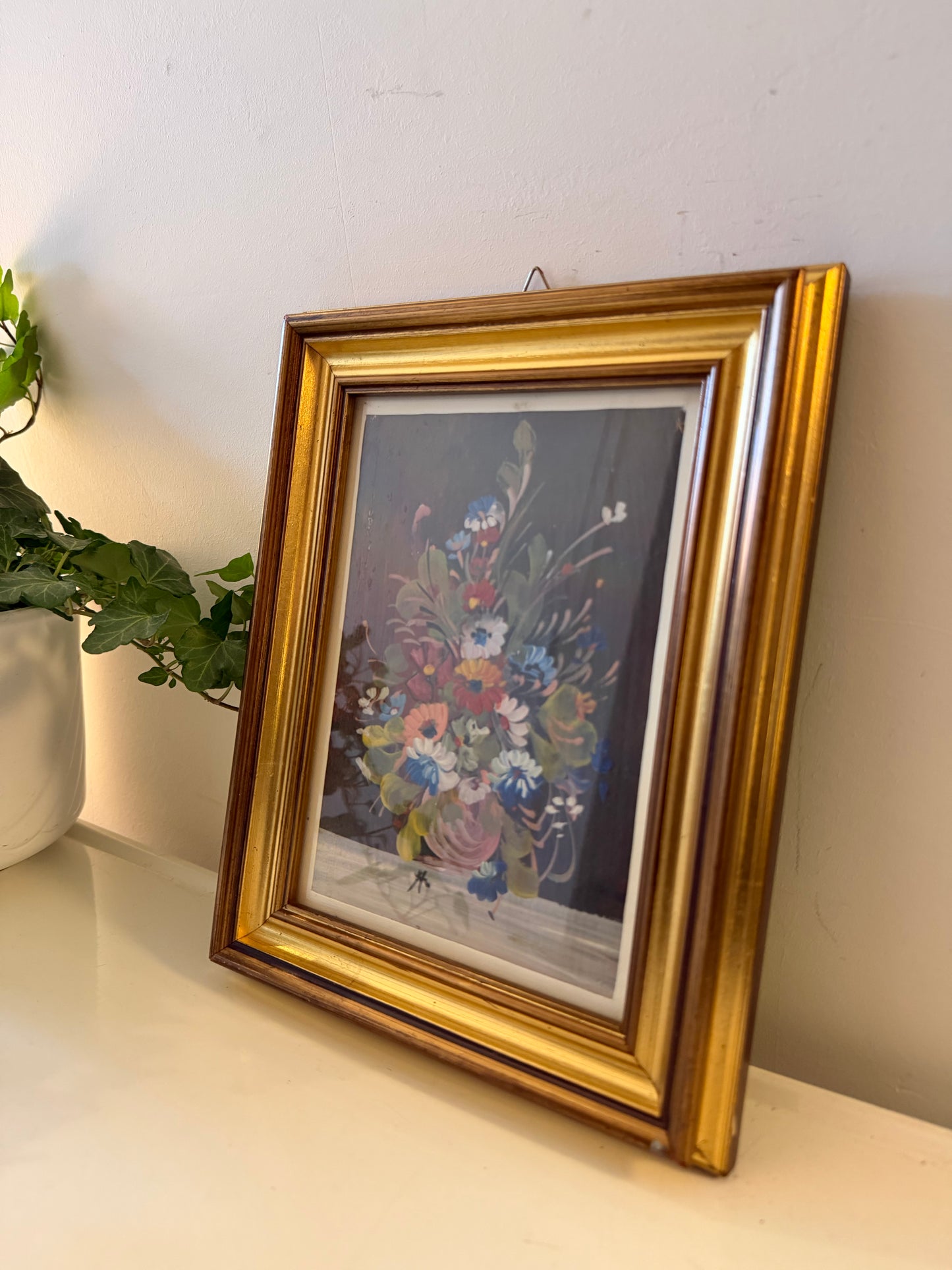 Goudkleurig lijstje met boeketje