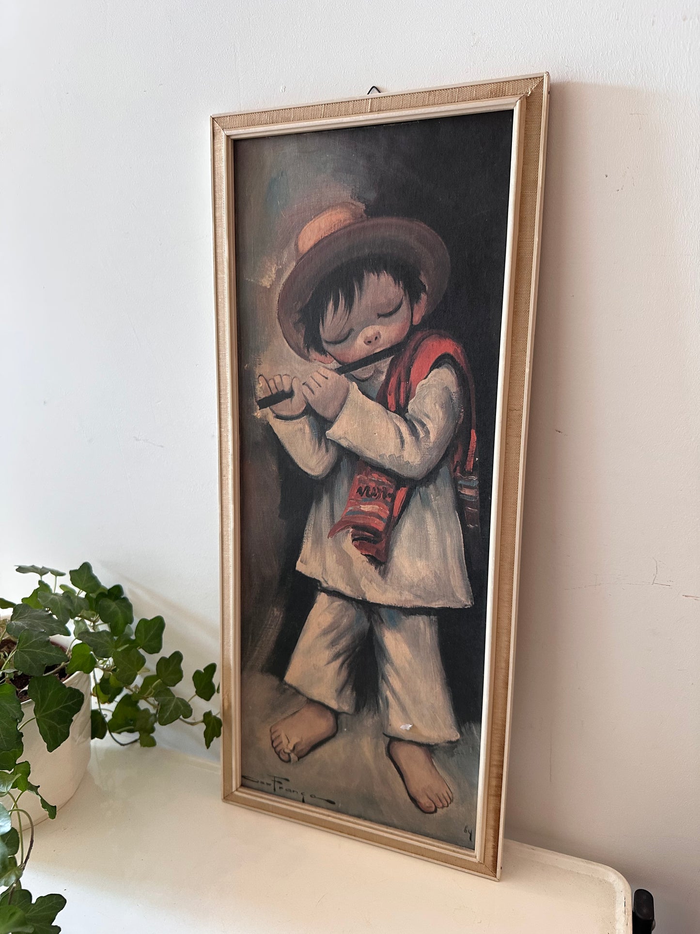 Schilderij met fluitend jongetje