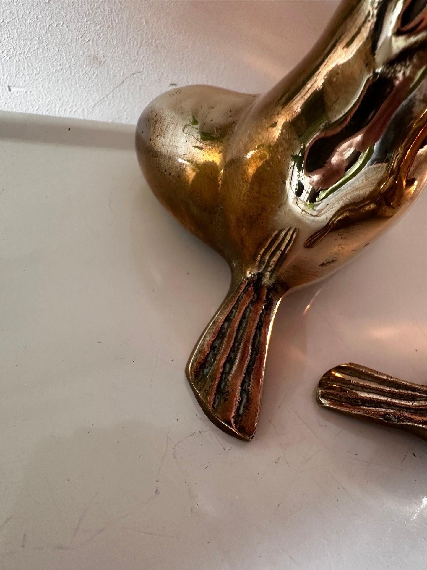 Messing set van twee zeehondjes