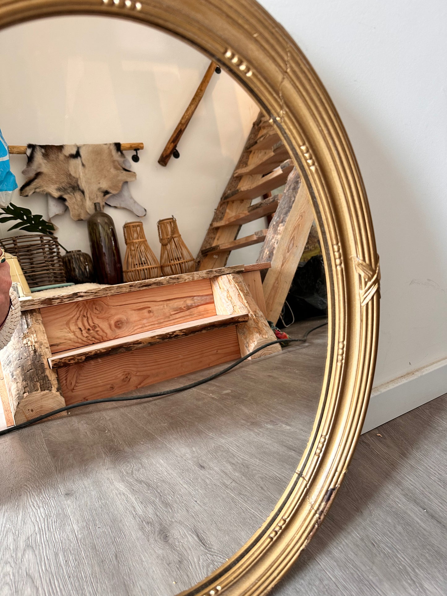 Ovale goudkleurige spiegel