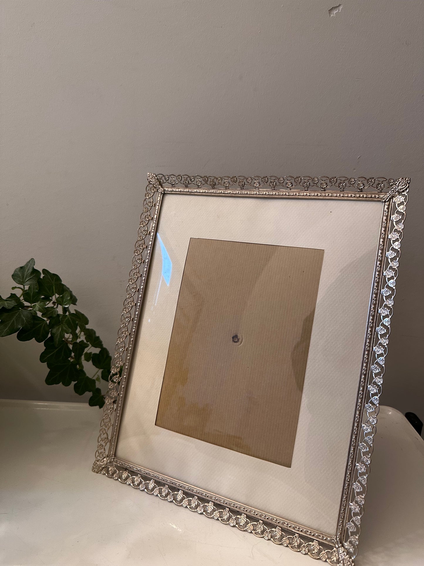 Jaren 60 fotolijstje met opengewerkte rand