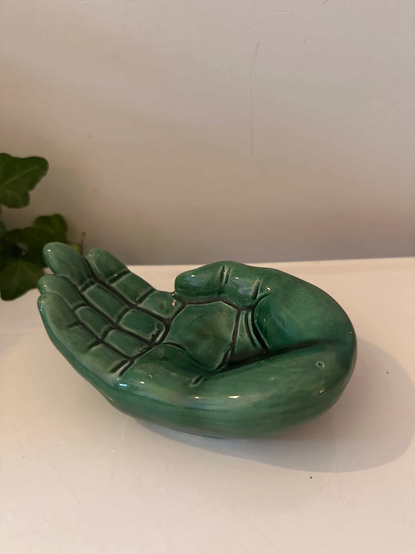 Keramieken groene hand
