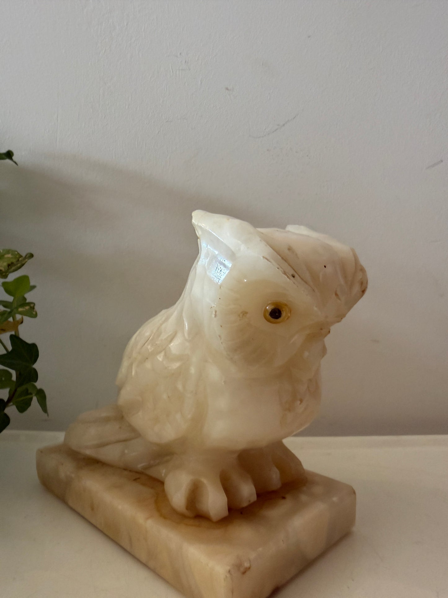 Albasten boekensteun in de vorm van een uil