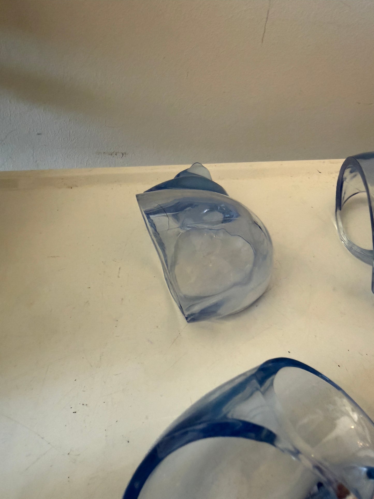 Set van 4 servetringen in de vorm van een schelp