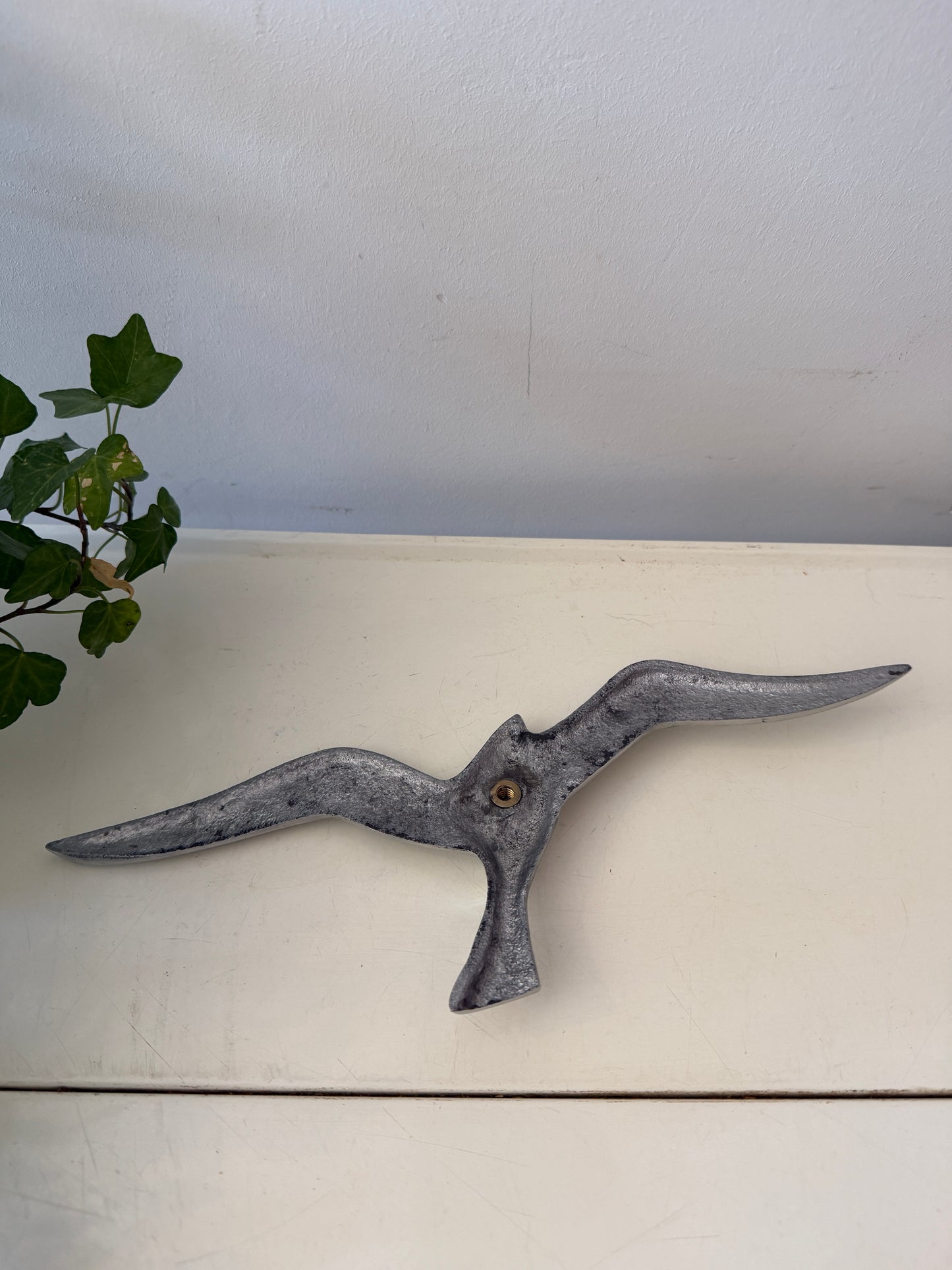 Lichtmetalen zwaluw voor aan de wand