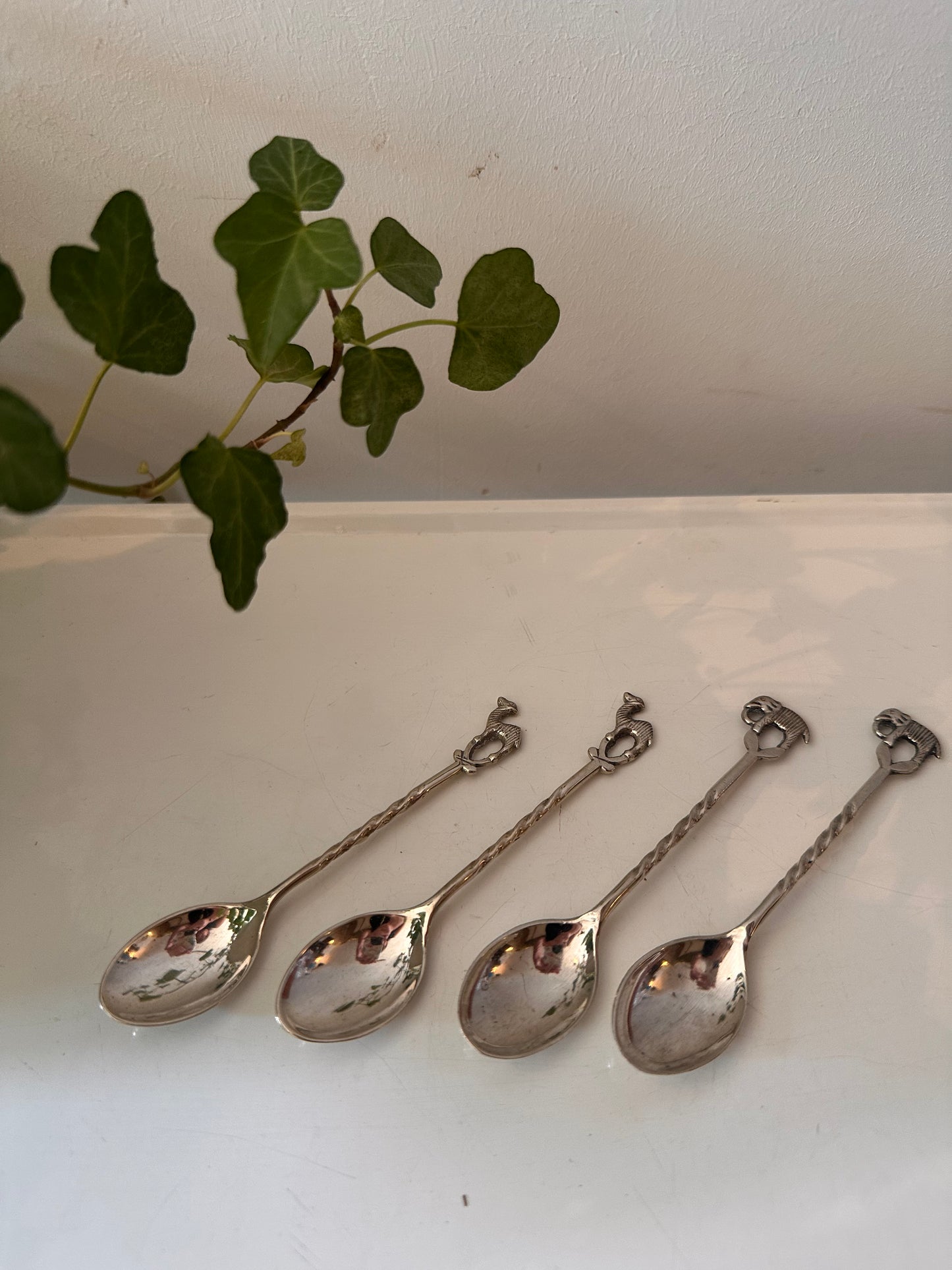 Set van 4 zilverkleurige theelepeltjes met dierenmotief