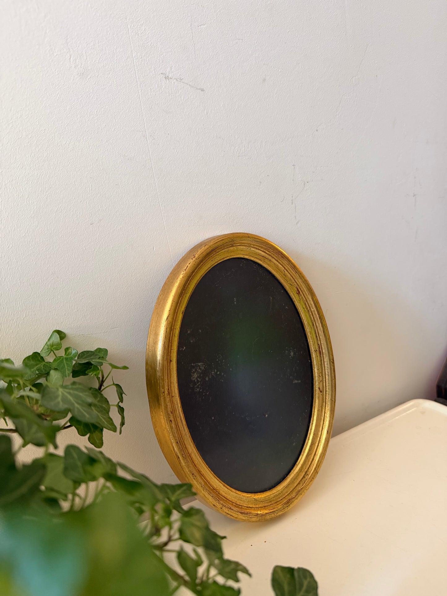 Ovaal goudkleurig fotolijstje