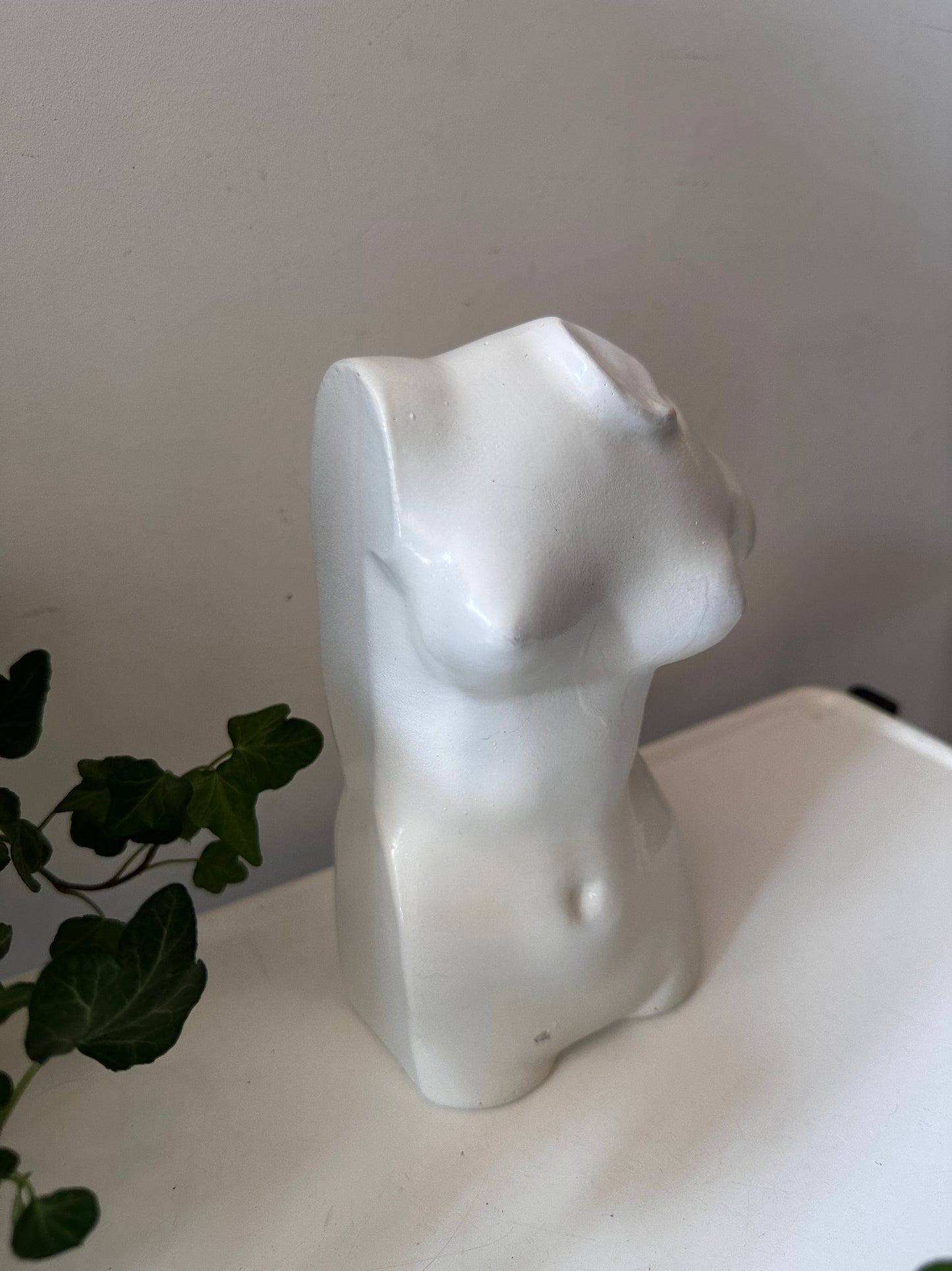 Vintage boekensteun torso