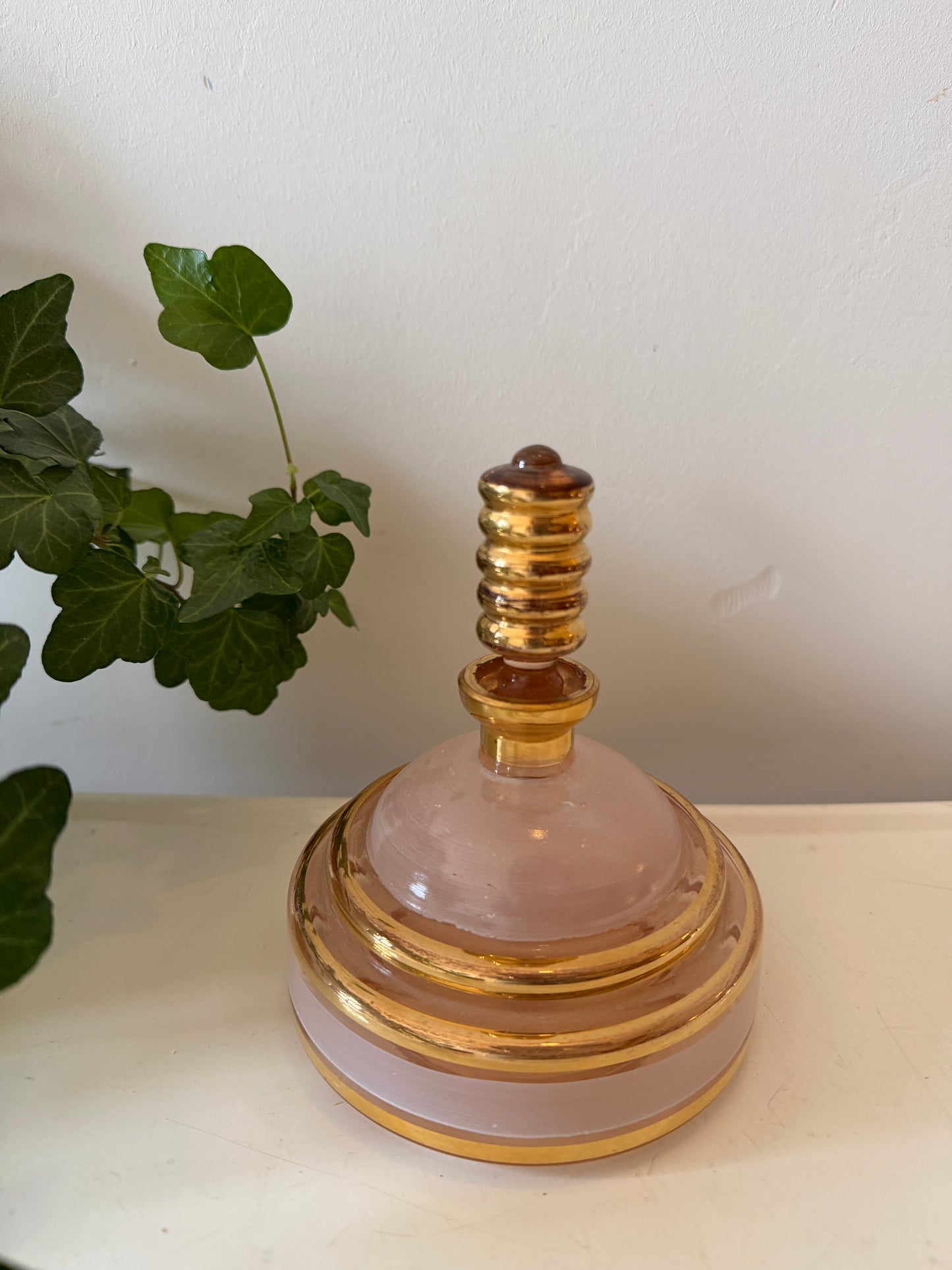 Parfumfles glas roze en goud kleurig