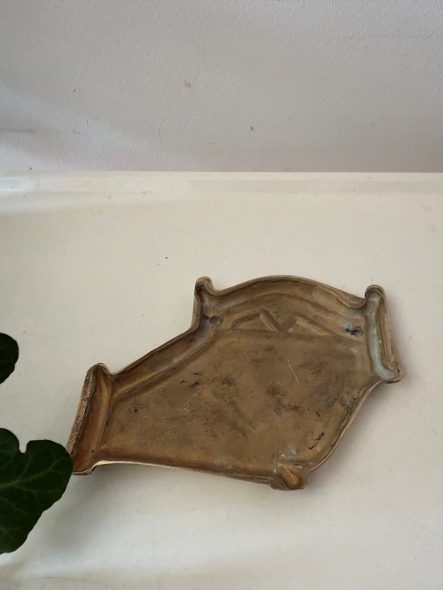 Messing deurornament voor de slaapkamer