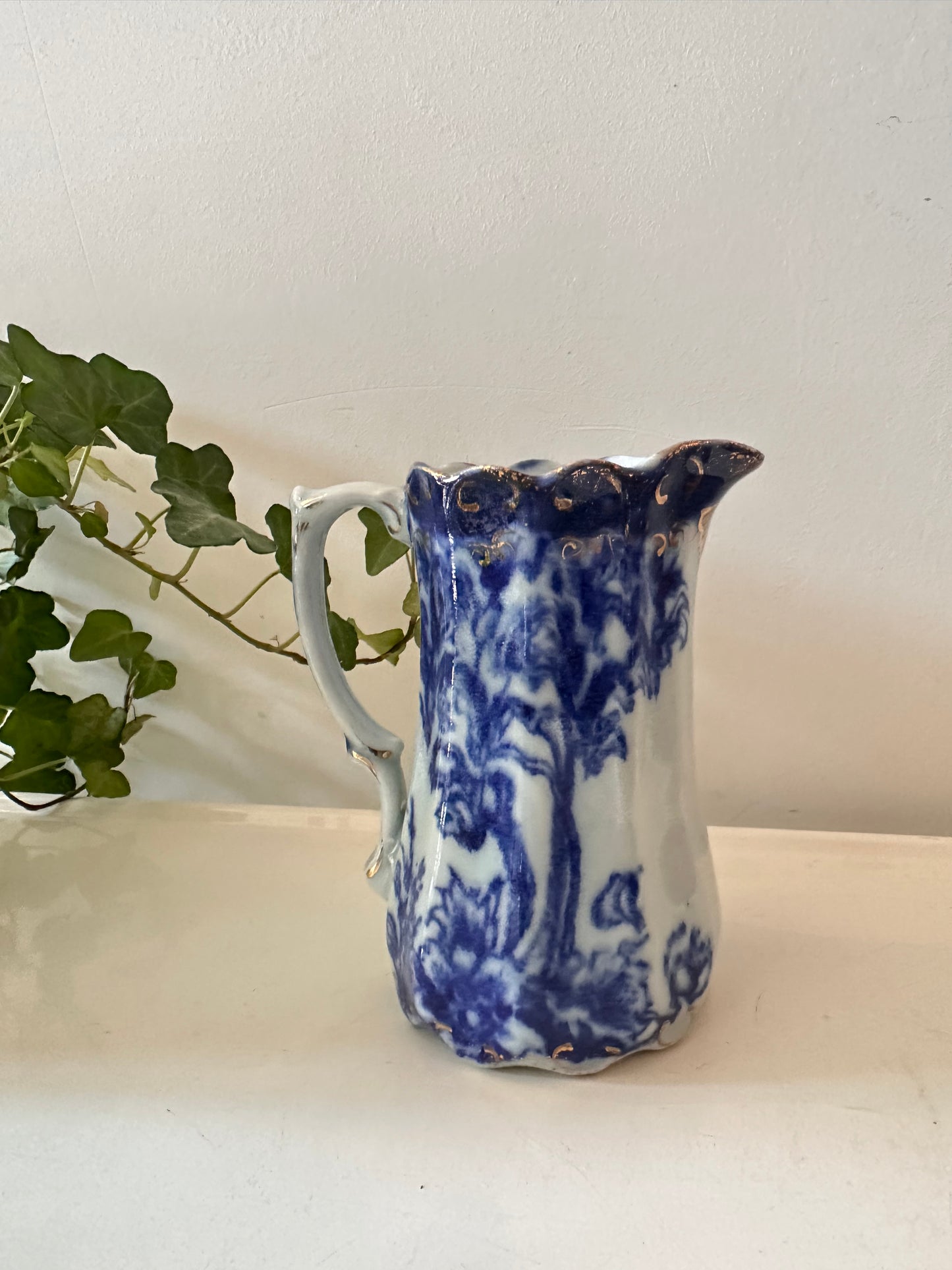 Blauw wit melkkannetje gemerkt