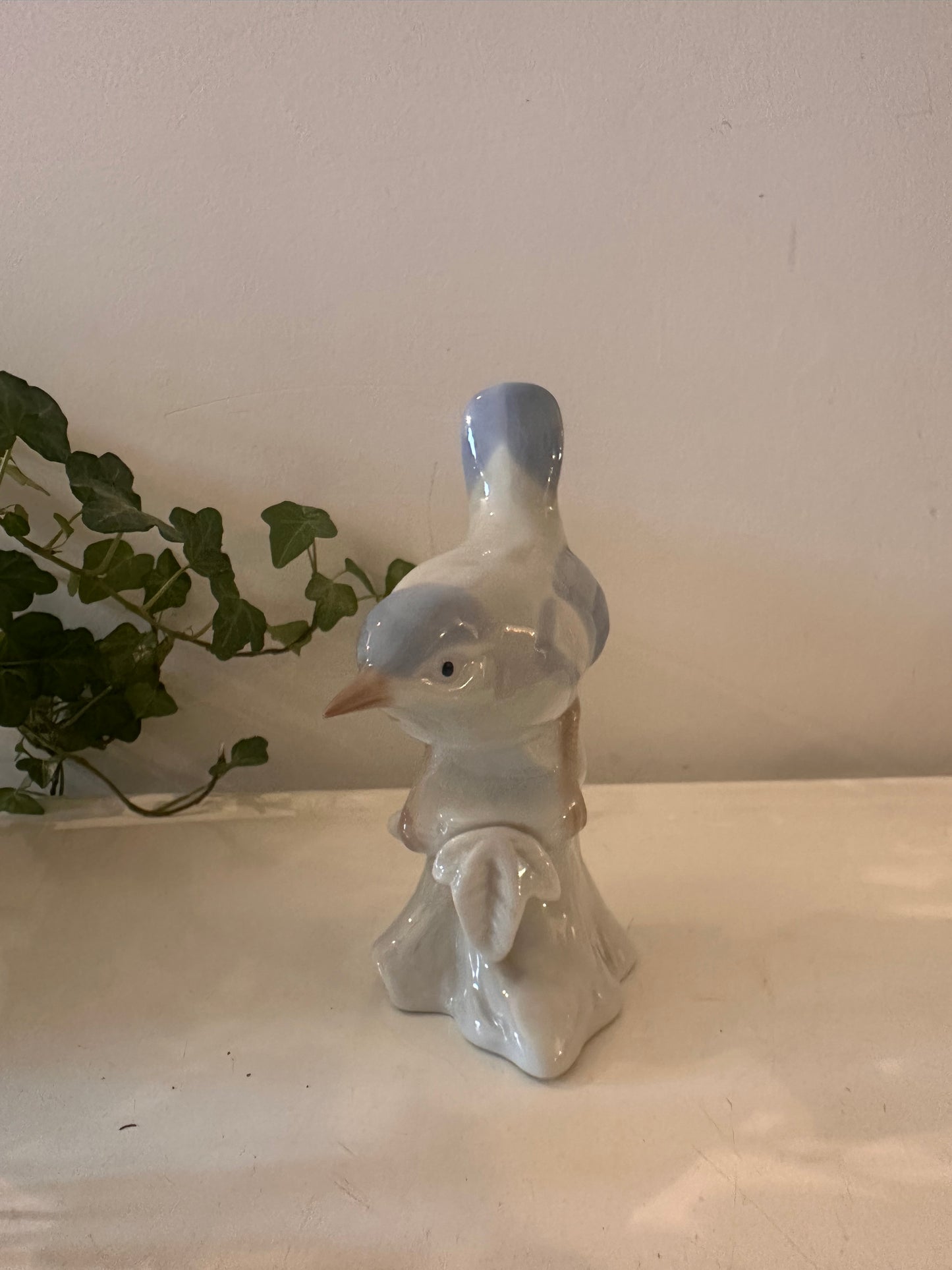 Porseleinen vogel beeldje