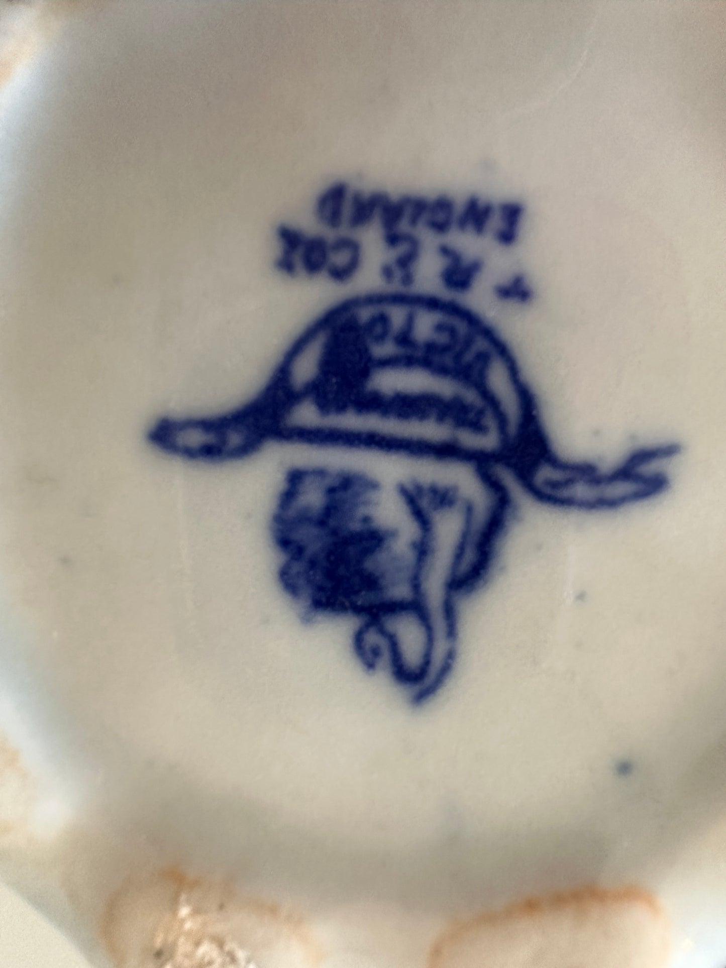 Blauw wit melkkannetje gemerkt