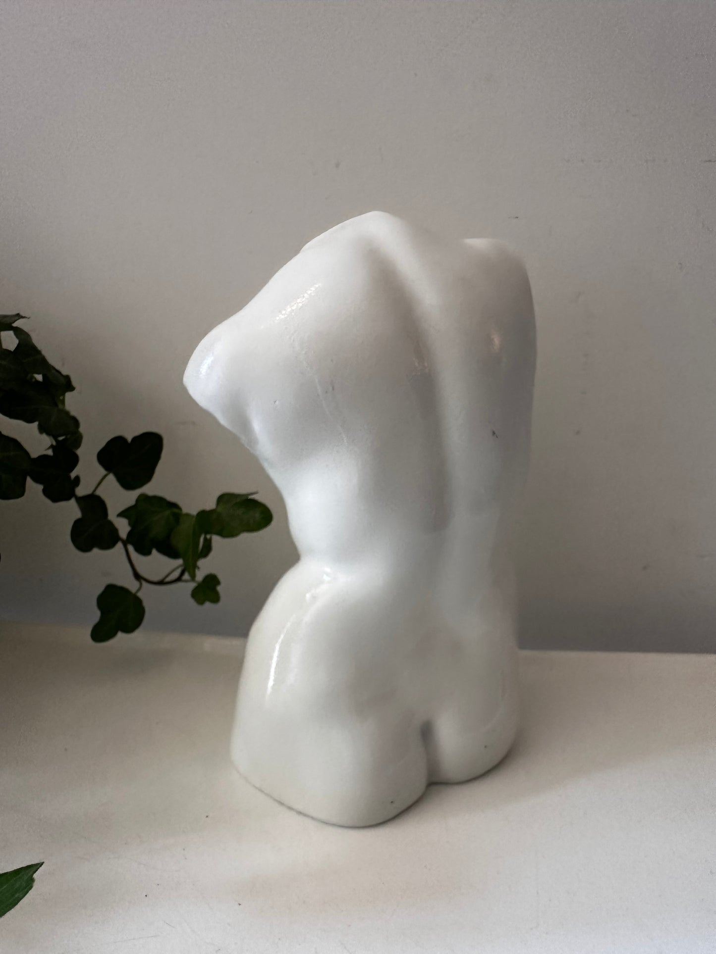 Vintage boekensteun torso