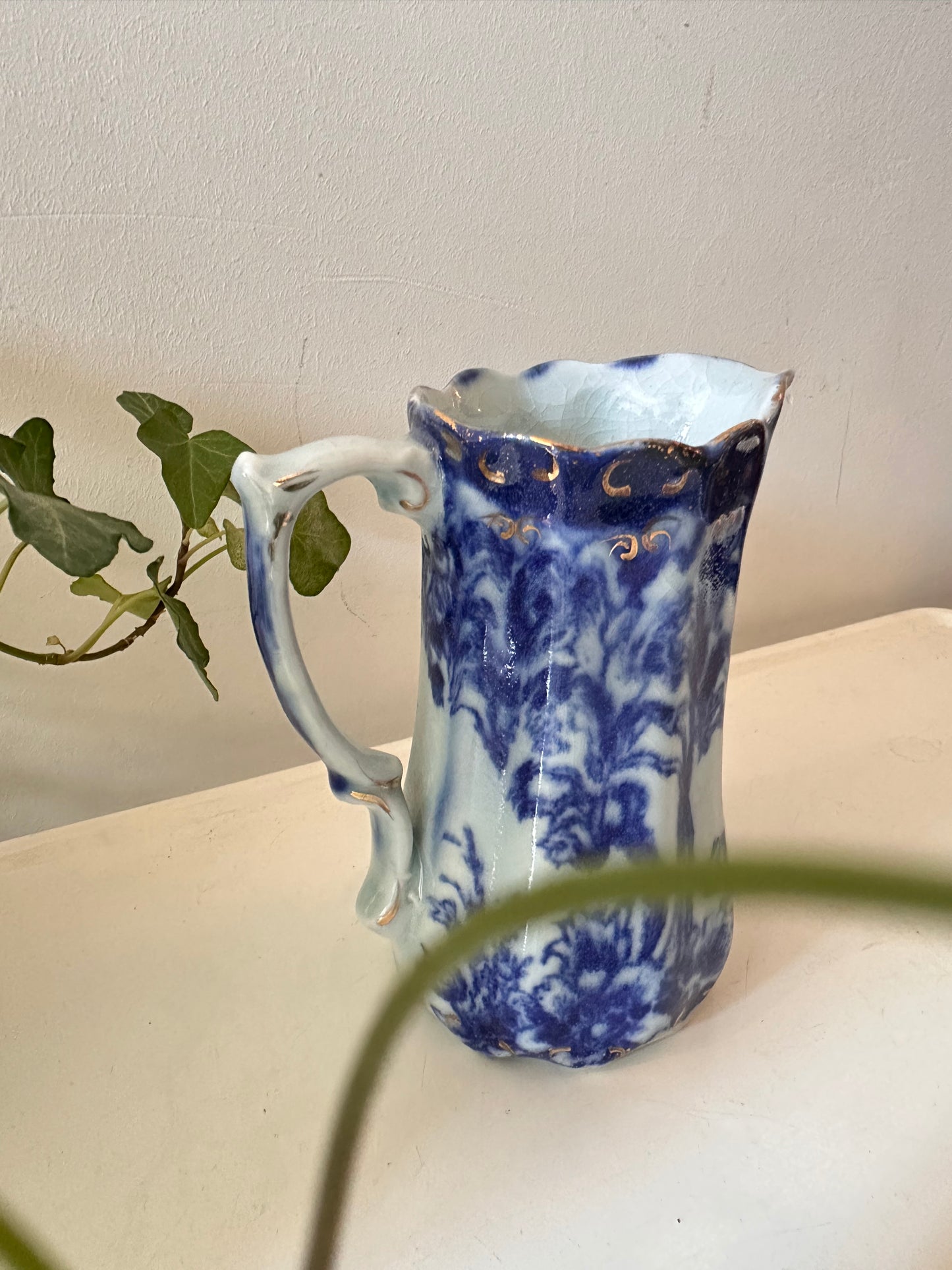 Blauw wit melkkannetje gemerkt