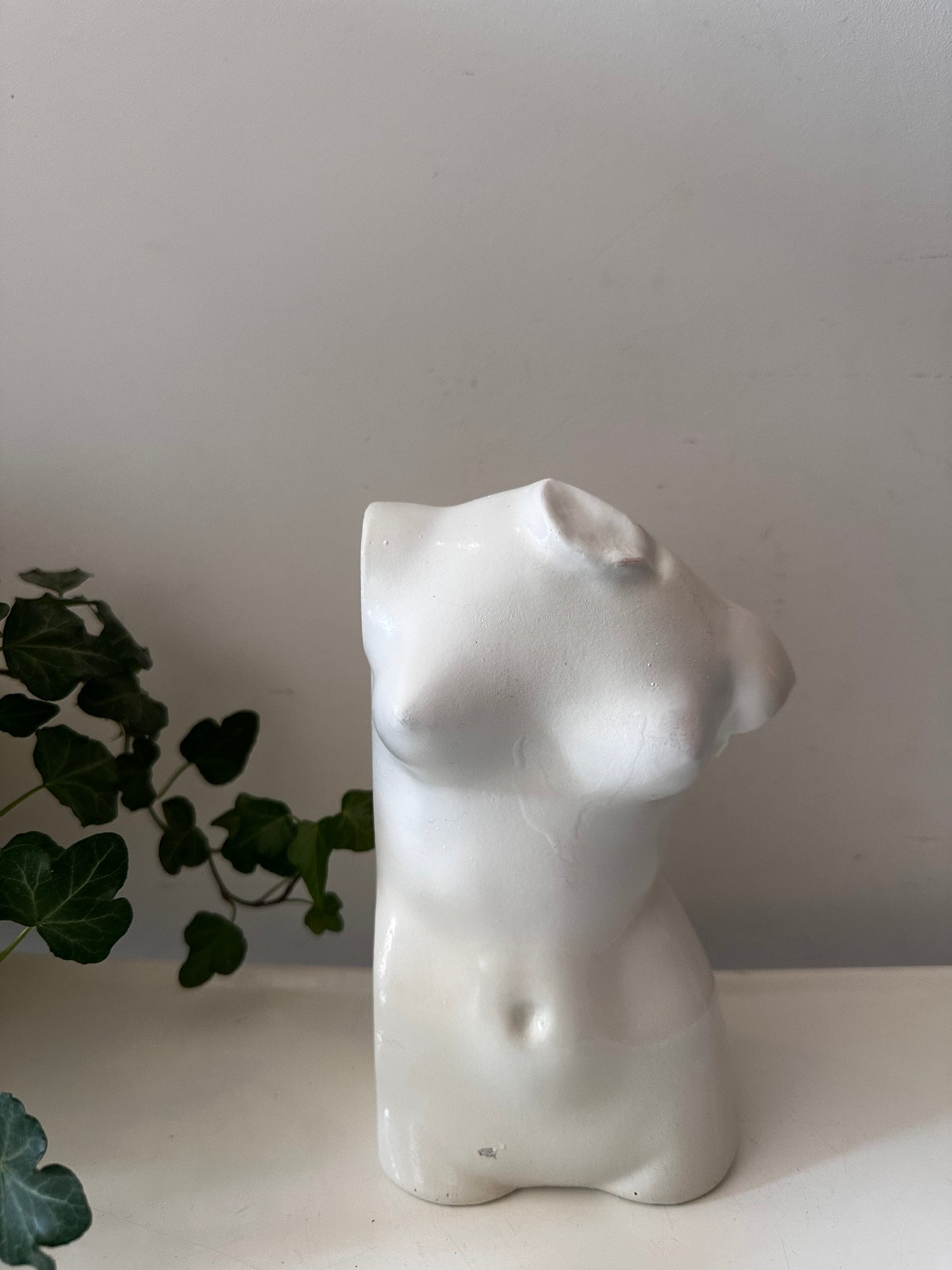 Vintage boekensteun torso