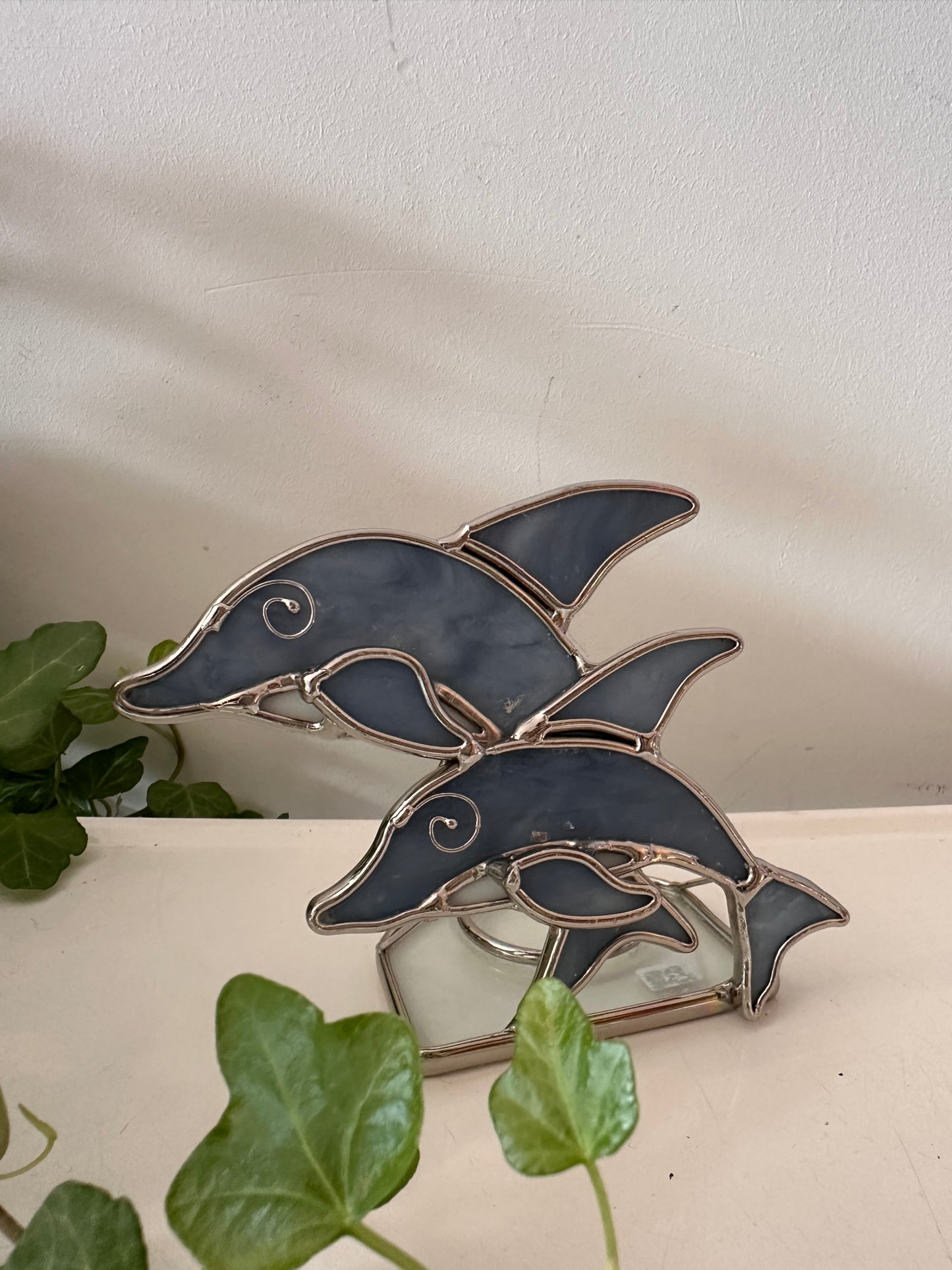 Waxinelichthouder vorm van een dolfijn