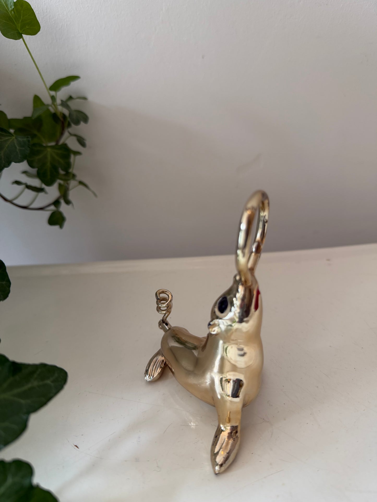 Flessenopener met kurkentrekker in de vorm van een zeehondje