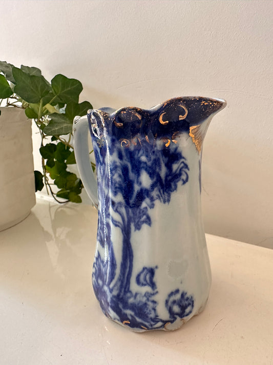 Blauw wit melkkannetje gemerkt