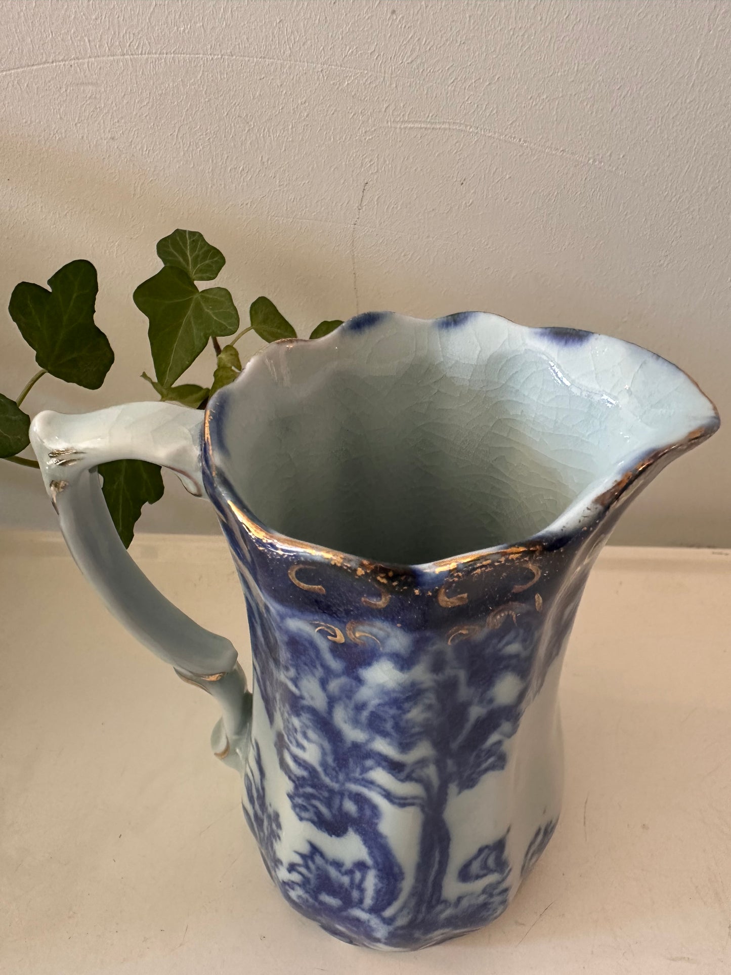 Blauw wit melkkannetje gemerkt