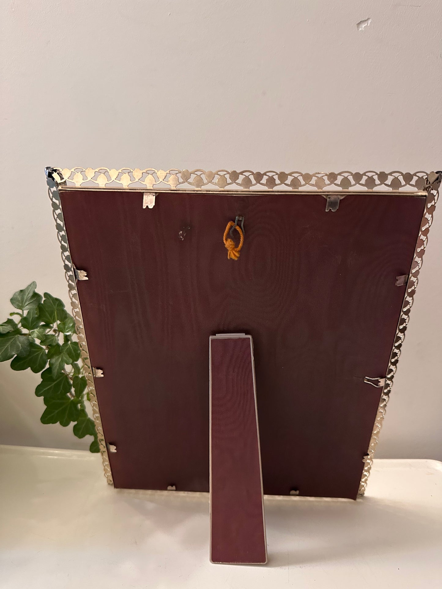 Jaren 60 fotolijstje met opengewerkte rand