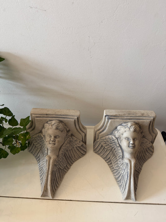 Set van wandconsoles met engelen