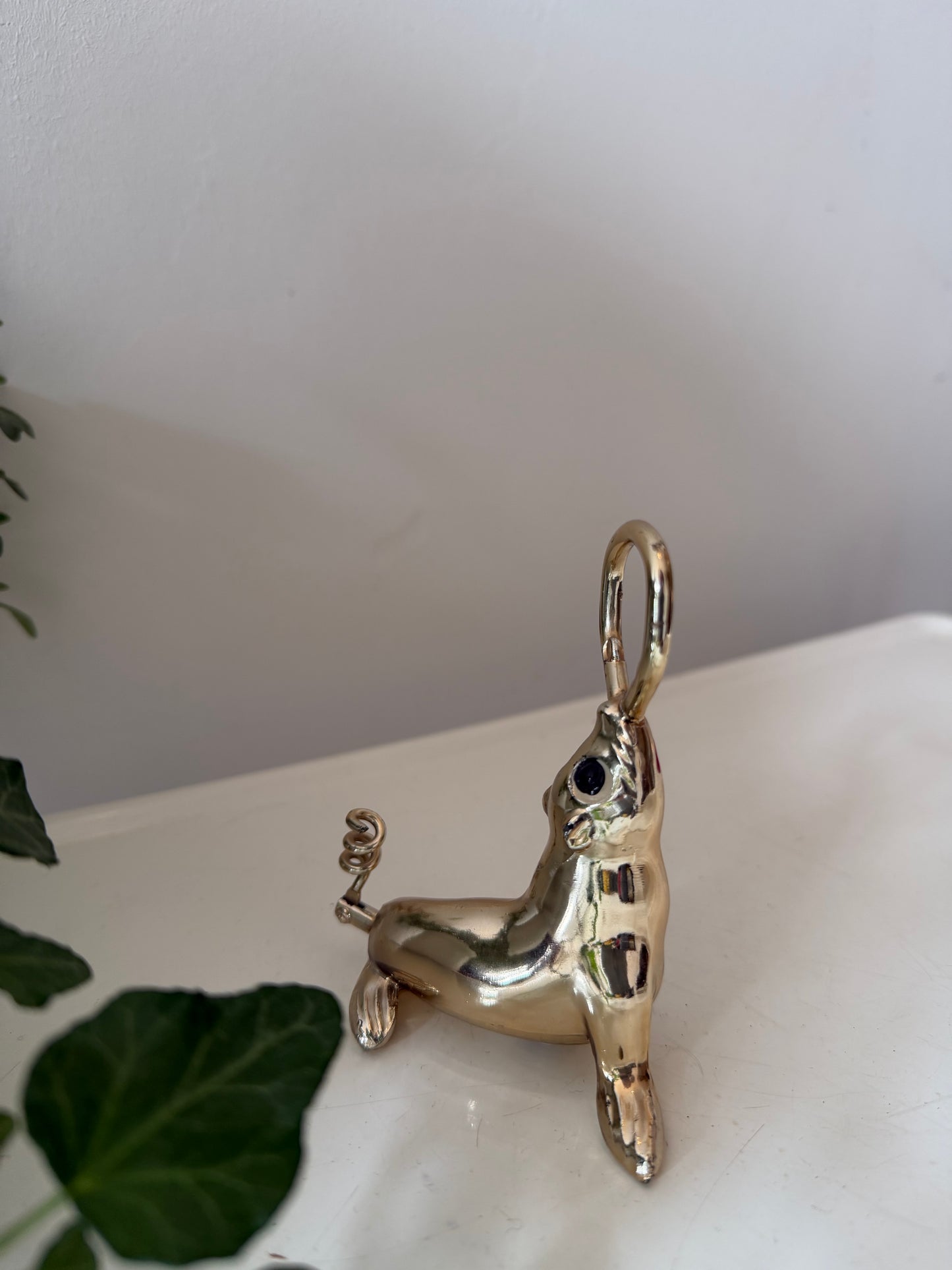 Flessenopener met kurkentrekker in de vorm van een zeehondje