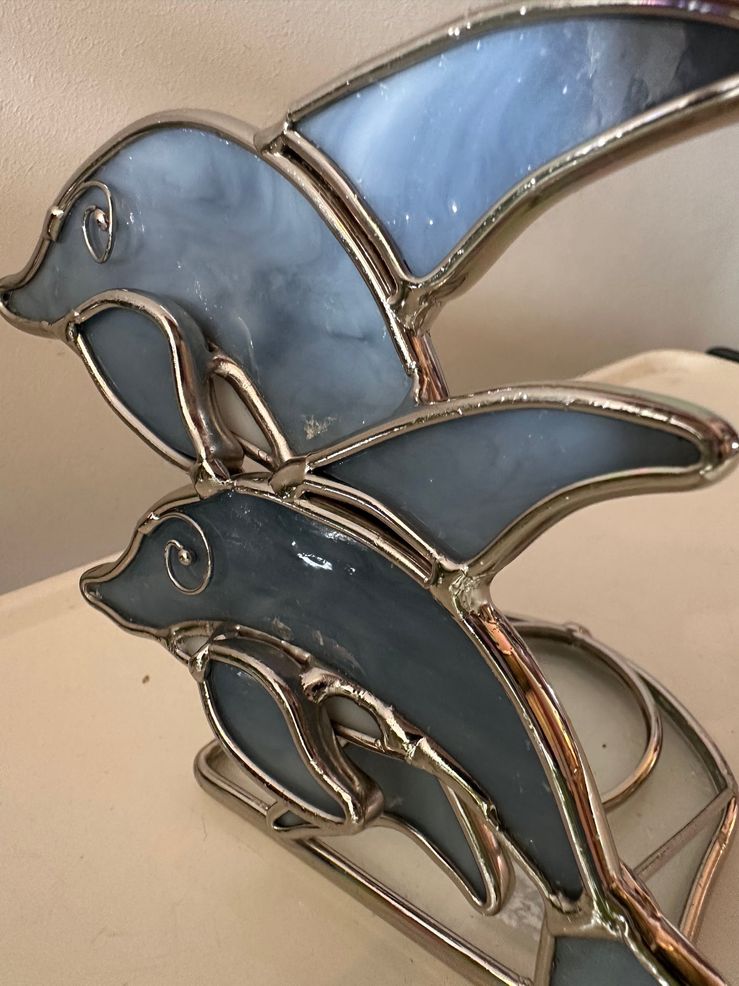 Waxinelichthouder vorm van een dolfijn