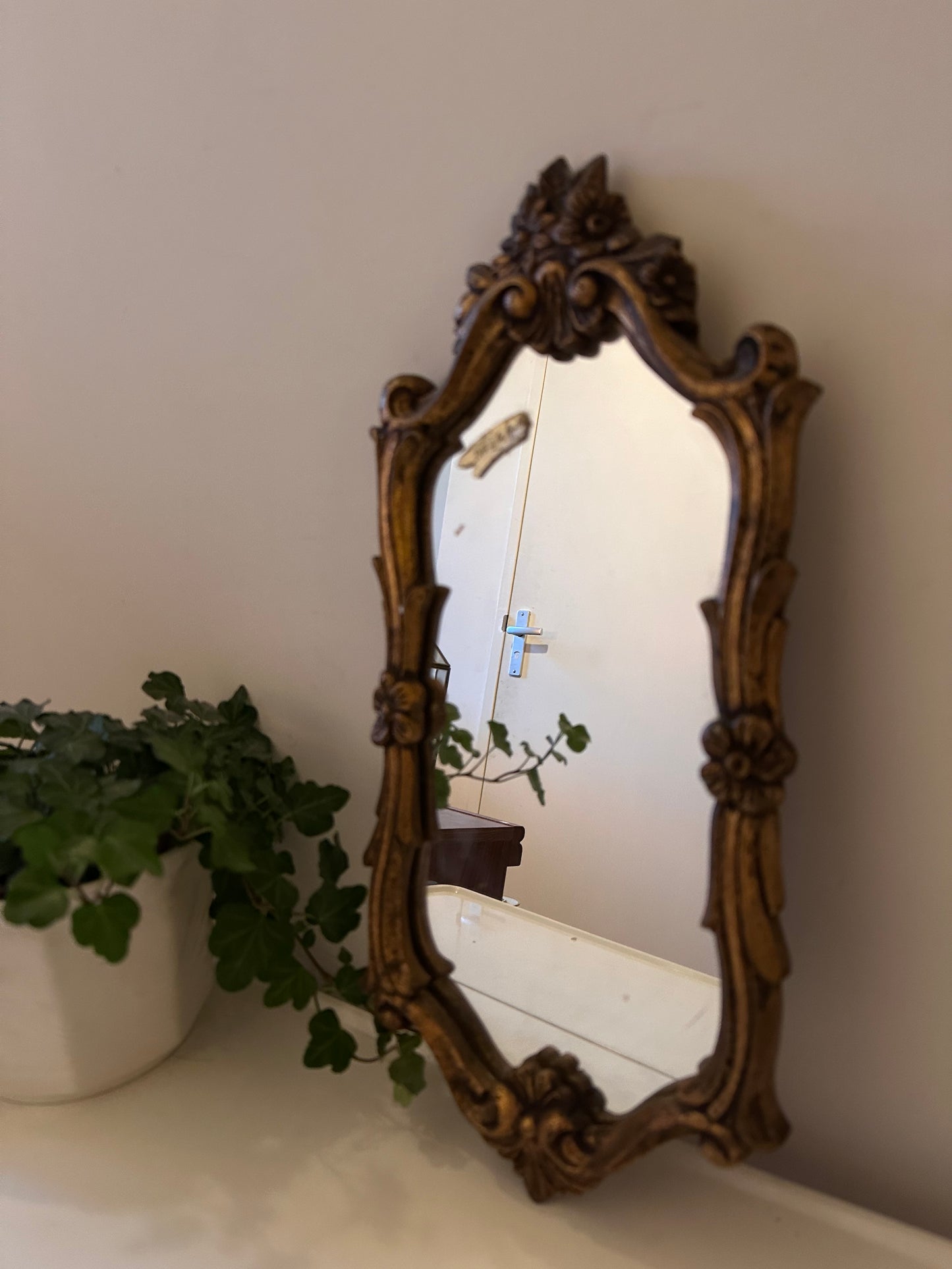 Wandspiegel met barok lijst