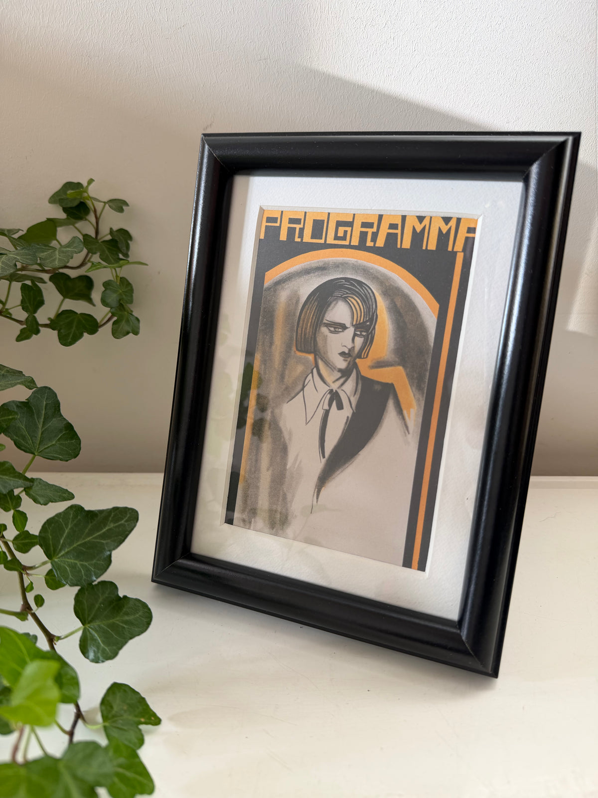 Art Deco prent in zwarte lijst