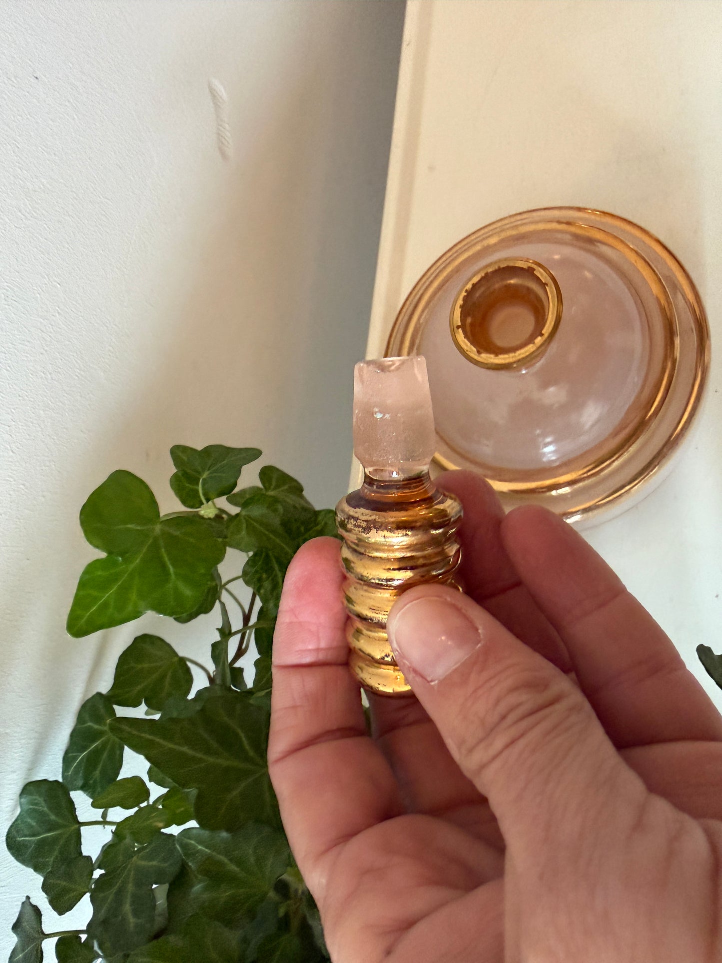 Parfumfles glas roze en goud kleurig