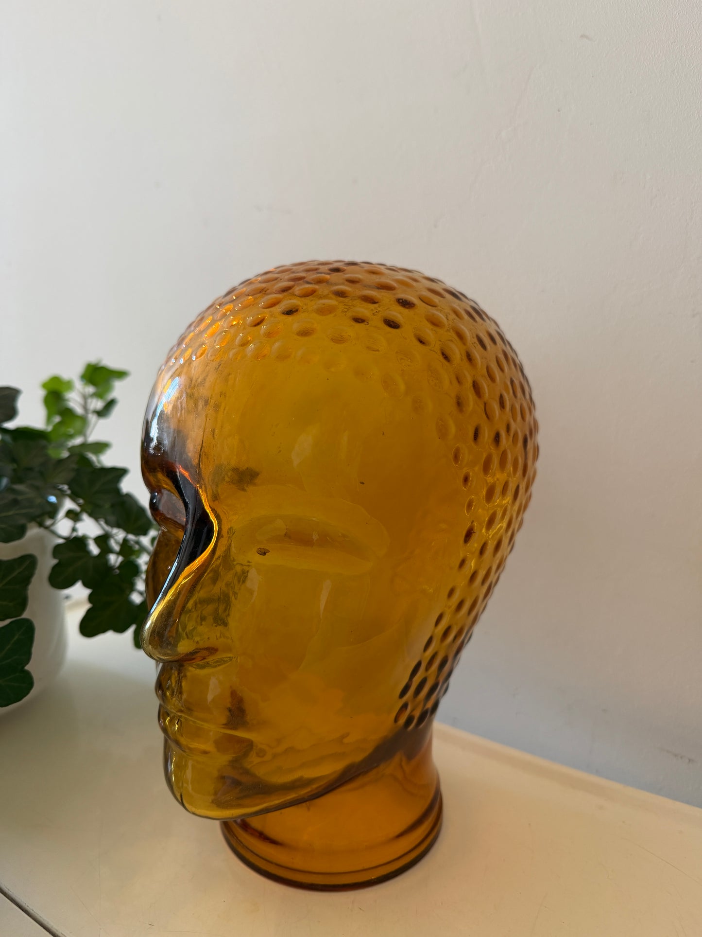 Glazen amberkleurig hoofd