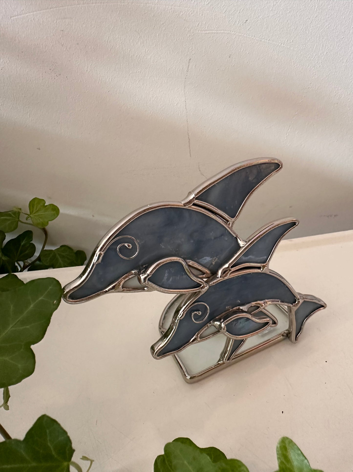 Waxinelichthouder vorm van een dolfijn