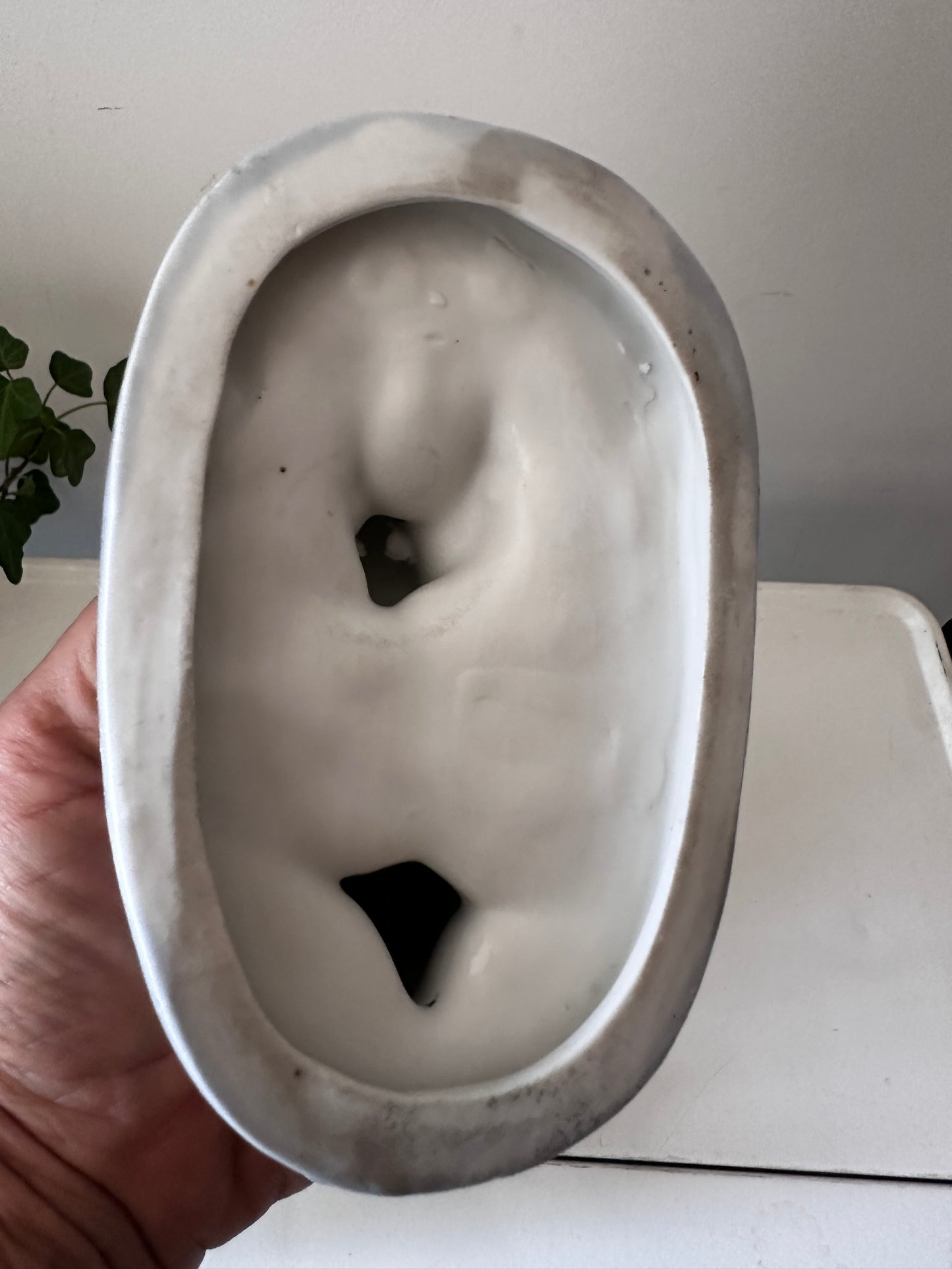 Porseleinen beeldje van gans met kleintjes