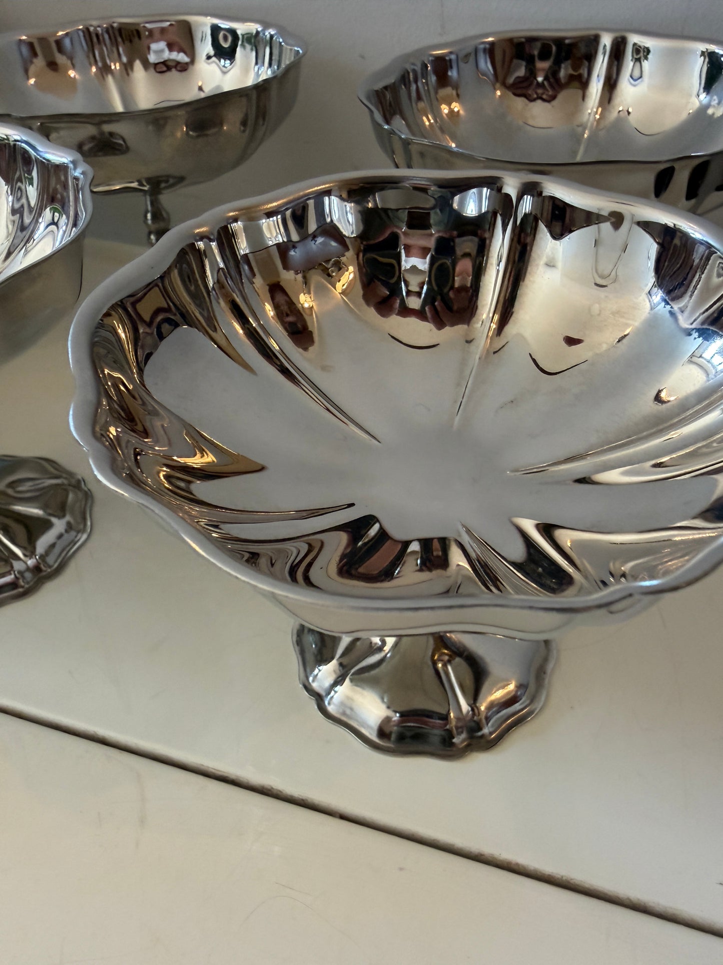 Set van 6 chrome golvende coupes