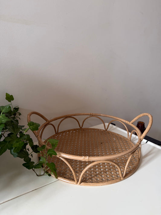 Rond metalen dienblad met rotan look