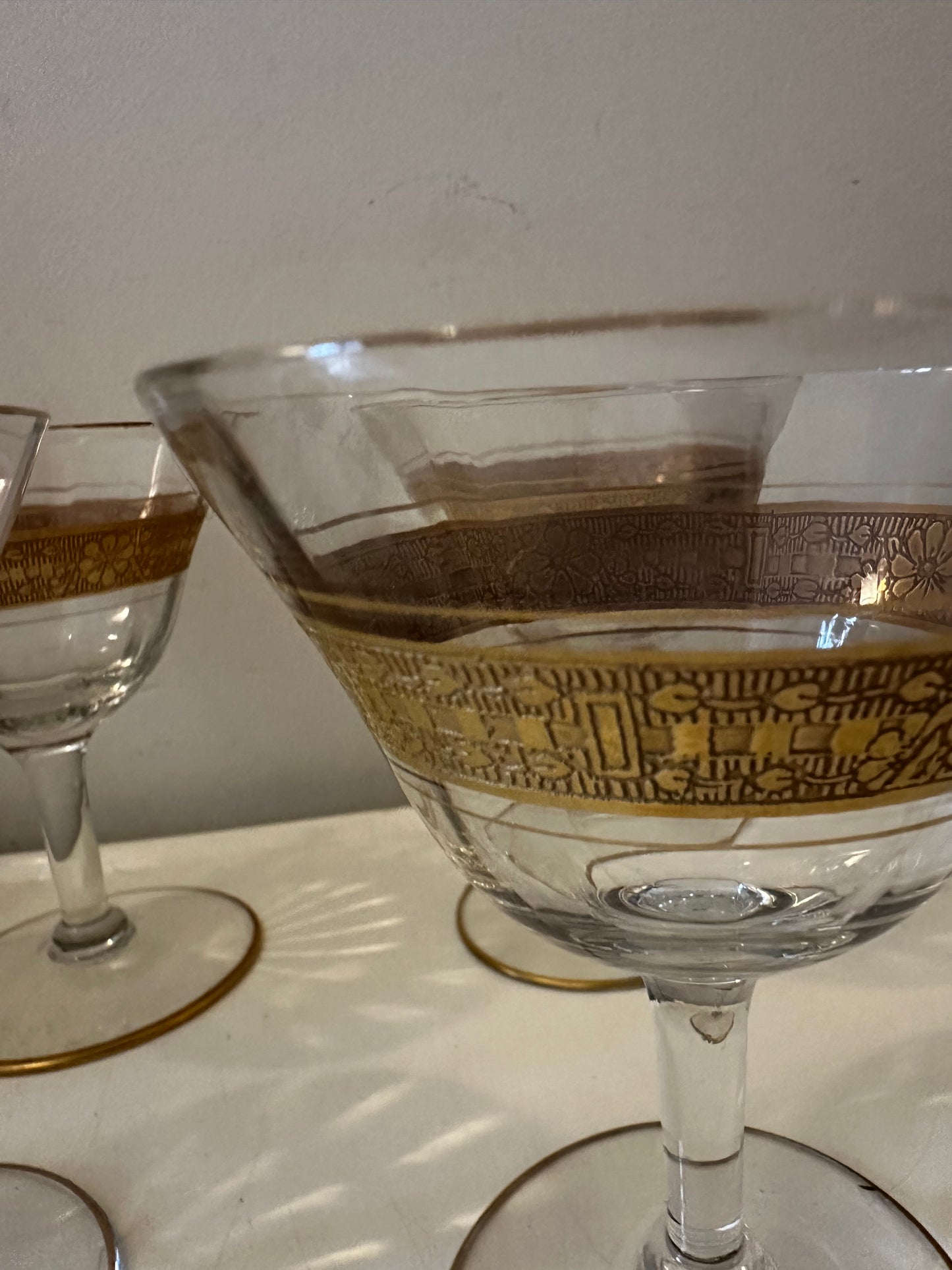 Coupe glazen met gouden rand