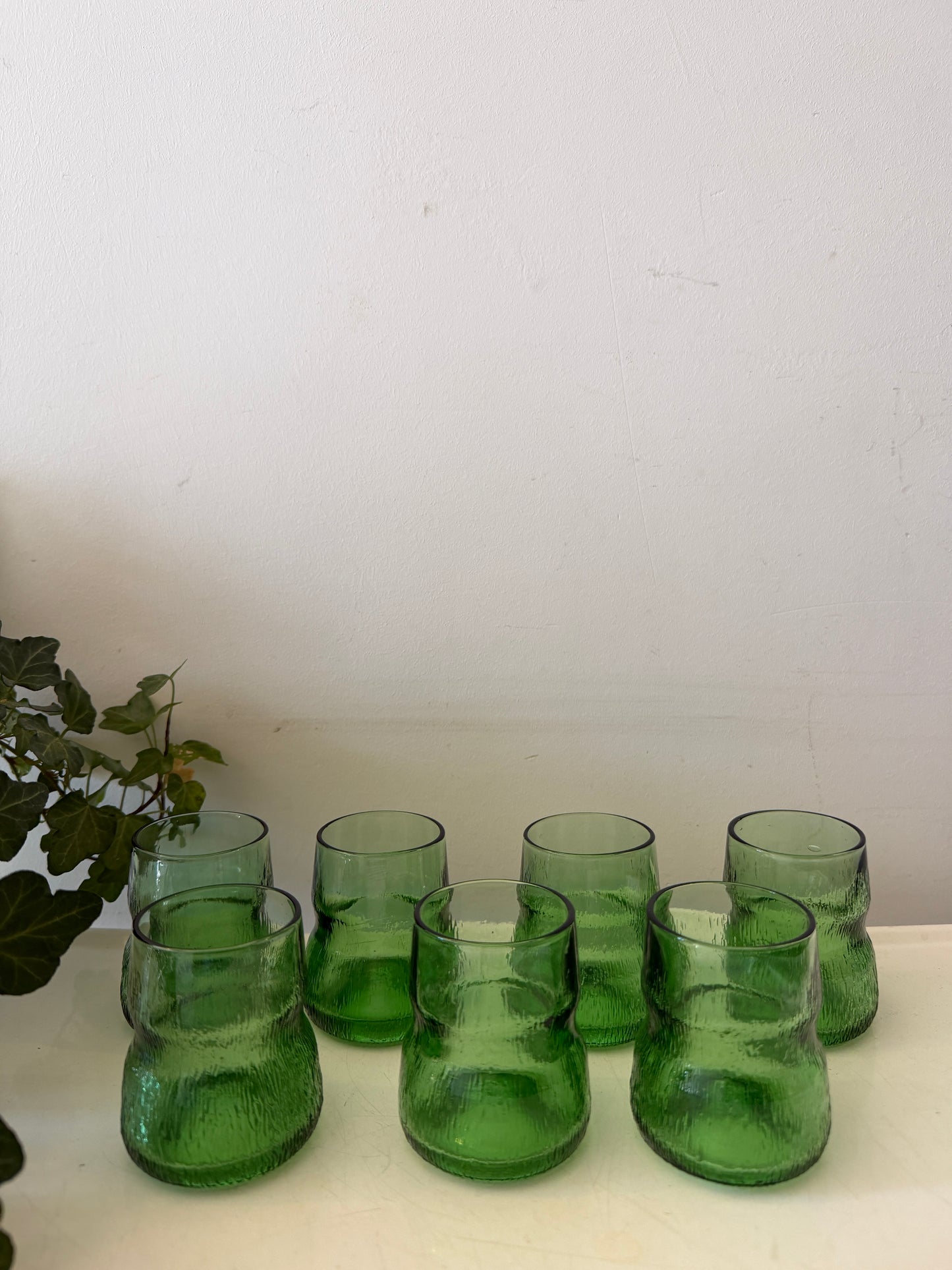 Set van 7 Amaro Averna smaragdgroene glazen