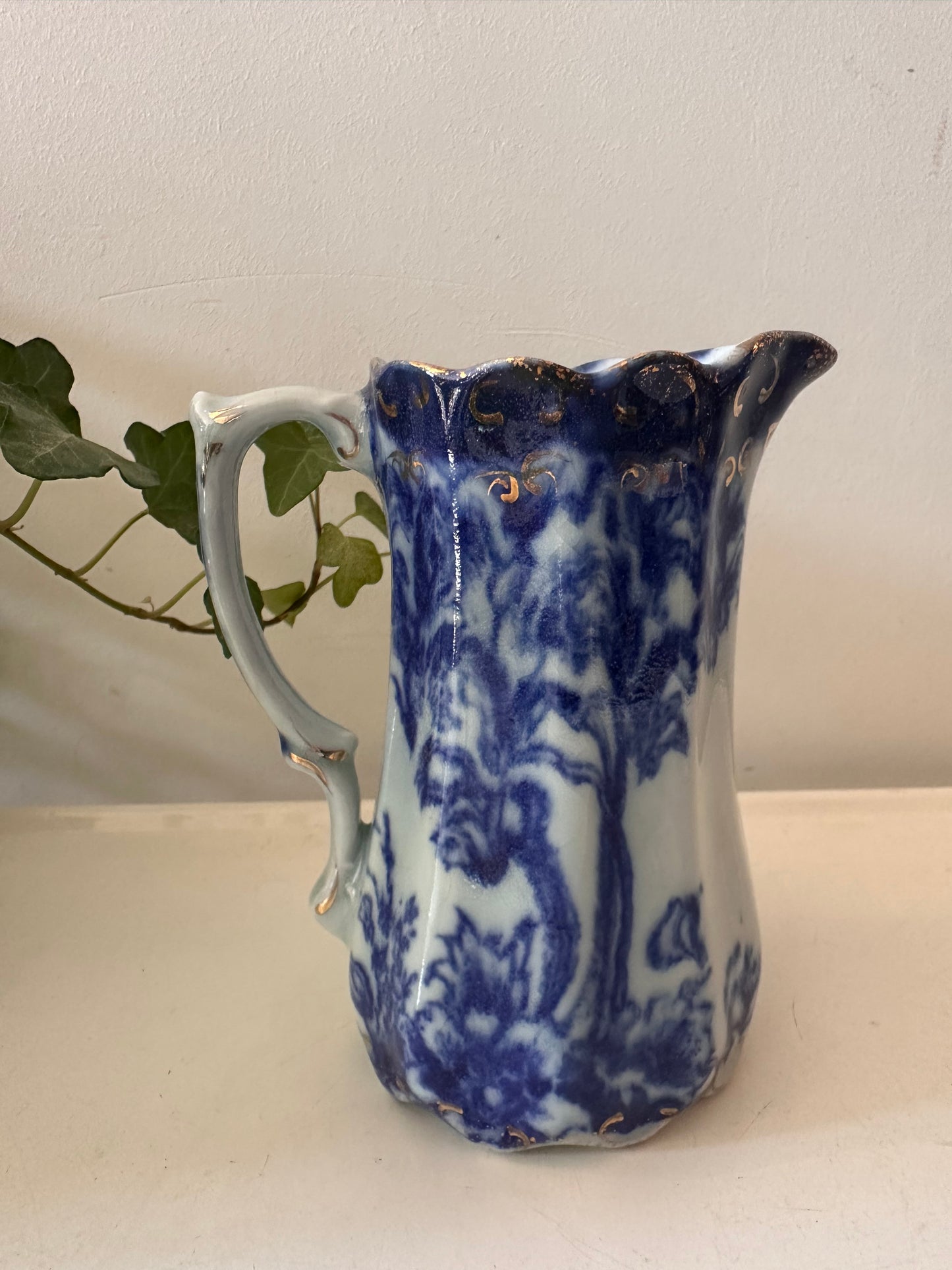 Blauw wit melkkannetje gemerkt